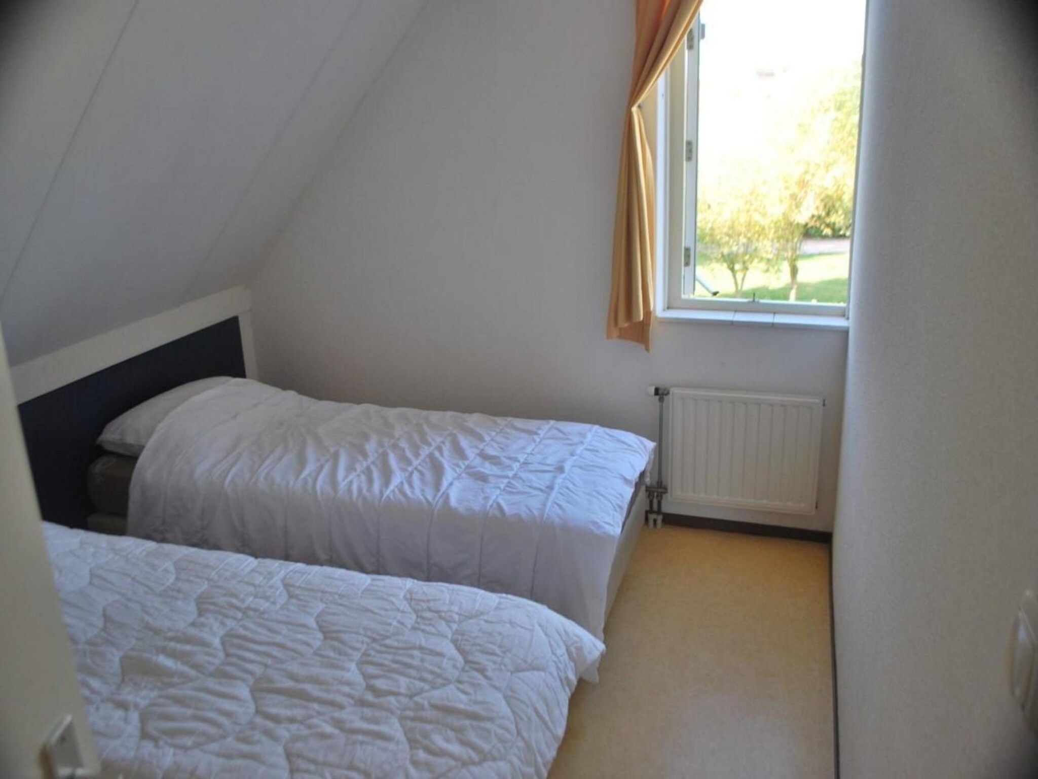 Een slaapkamer van Scheldeveste 138 Zwin Breskens in Breskens