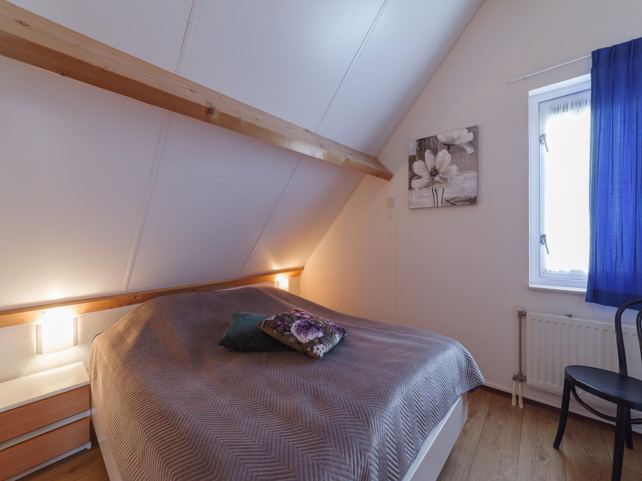 Een slaapkamer van Villapark De Oesterbaai 23 in Wemeldinge