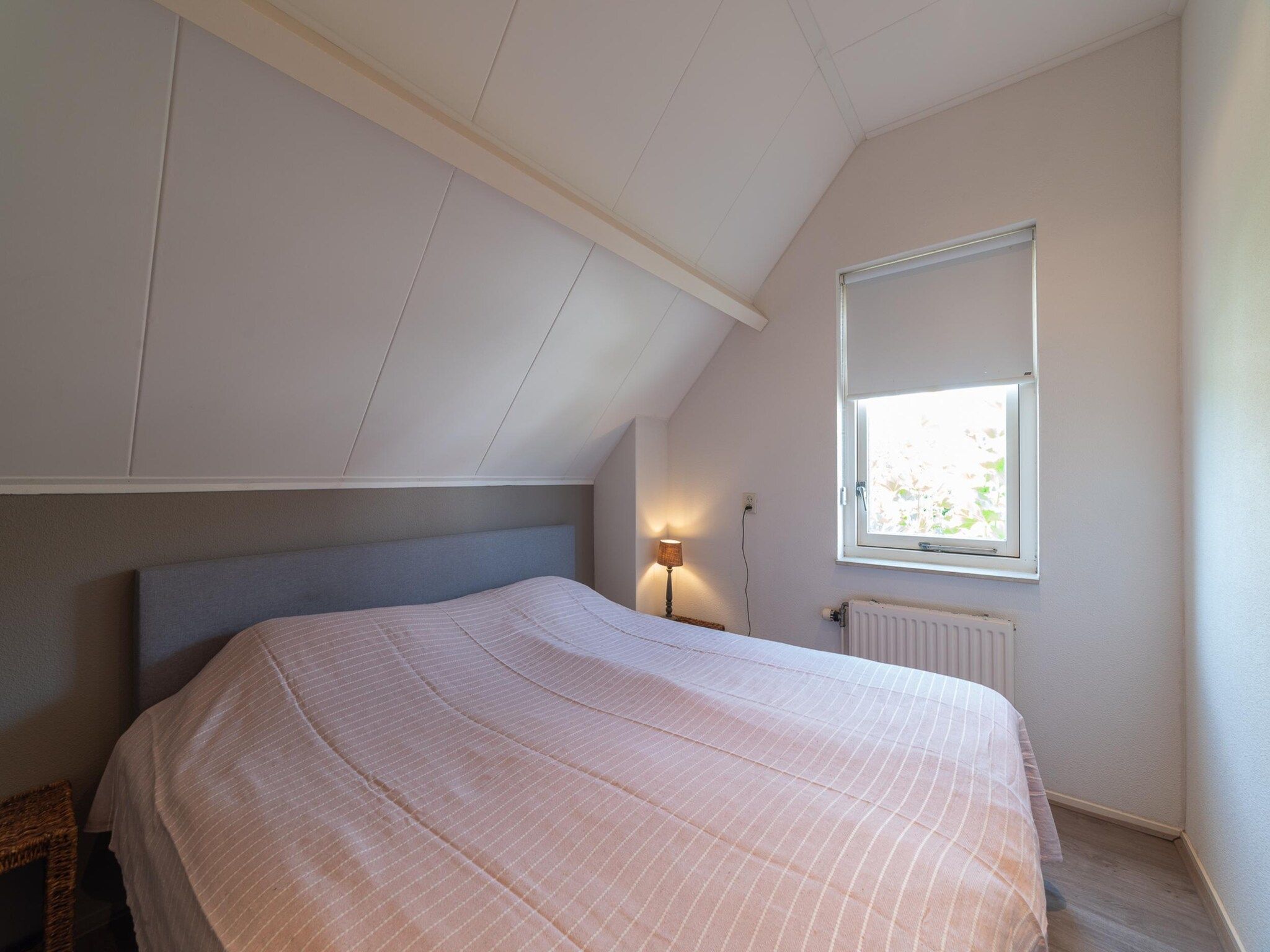 Een slaapkamer van Villapark De Oesterbaai 26 in Wemeldinge