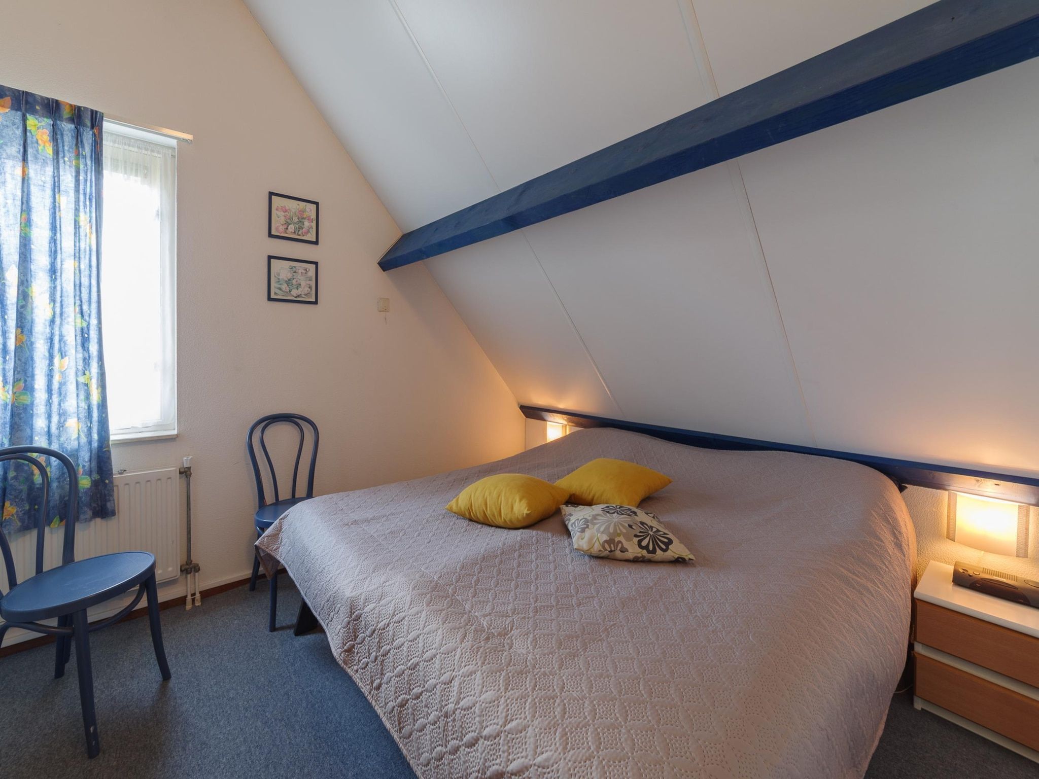 Een slaapkamer van Villapark De Oesterbaai 27 in Wemeldinge