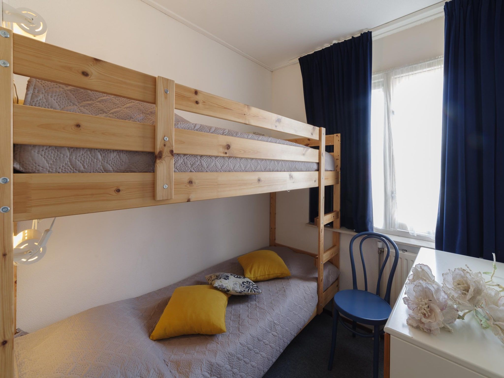 Een slaapkamer van Villapark De Oesterbaai 27 in Wemeldinge