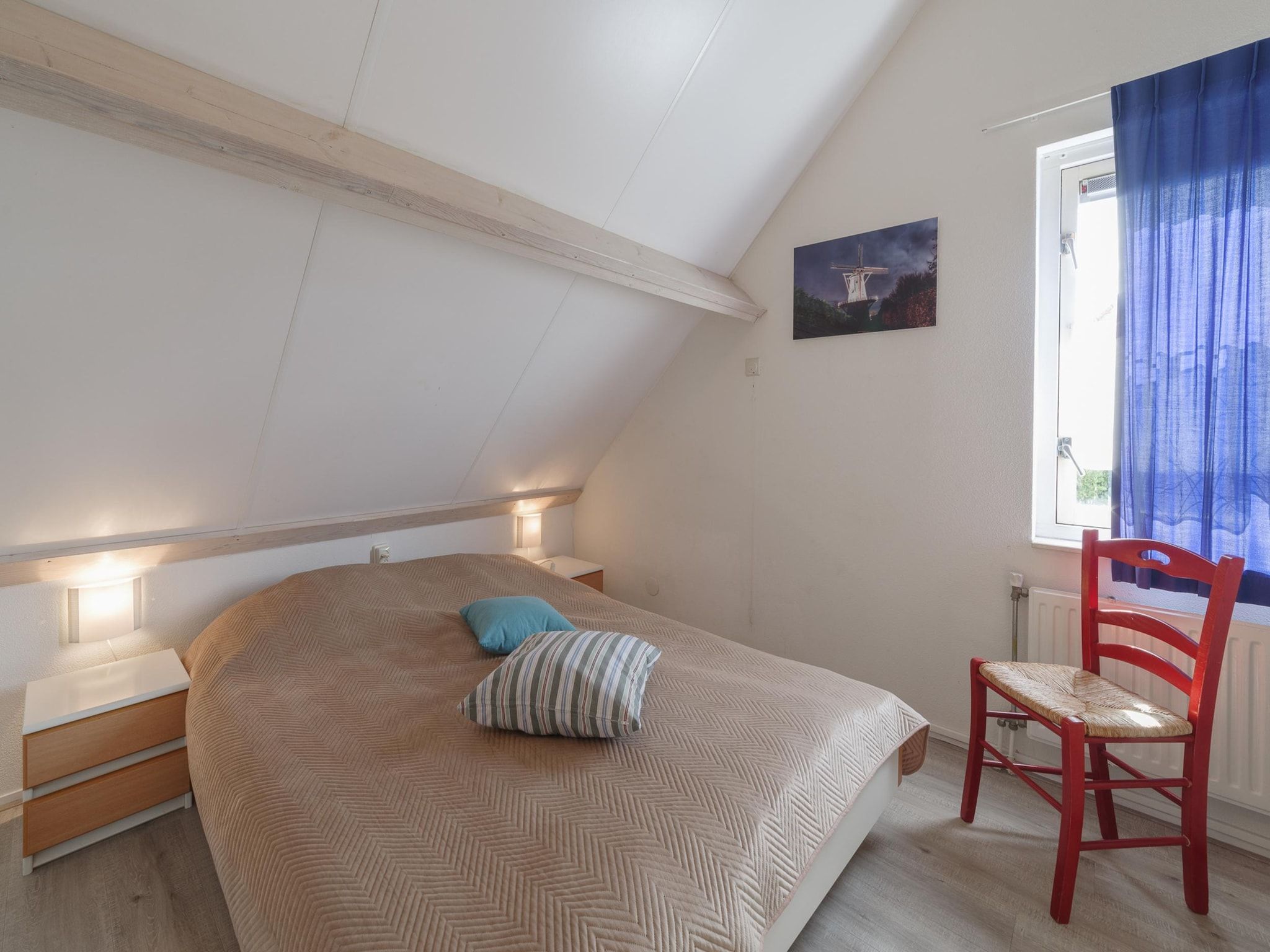 Een slaapkamer van Villapark De Oesterbaai 28 in Wemeldinge