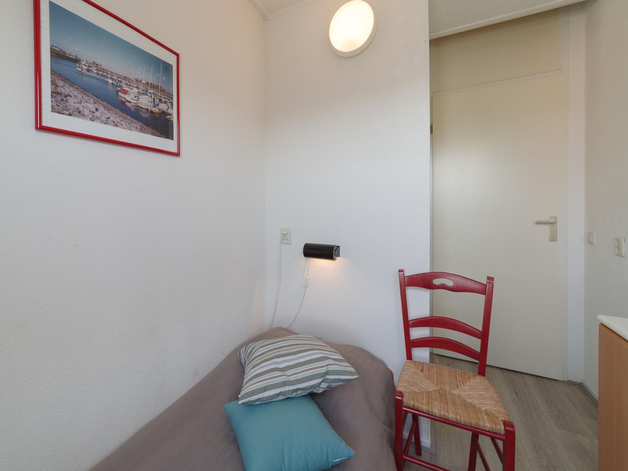 Een slaapkamer van Villapark De Oesterbaai 28 in Wemeldinge