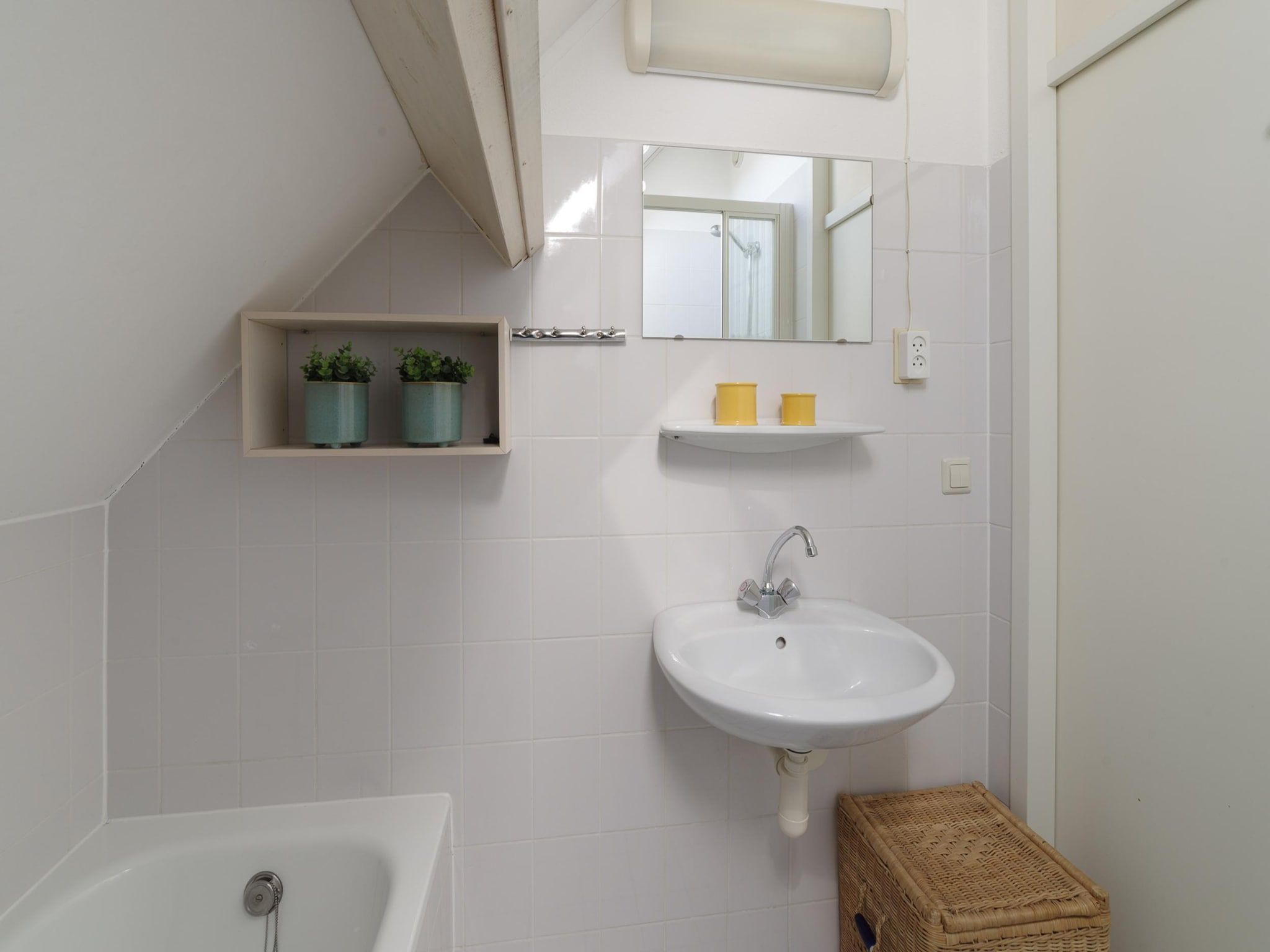 De badkamer van Villapark De Oesterbaai 28 in Wemeldinge