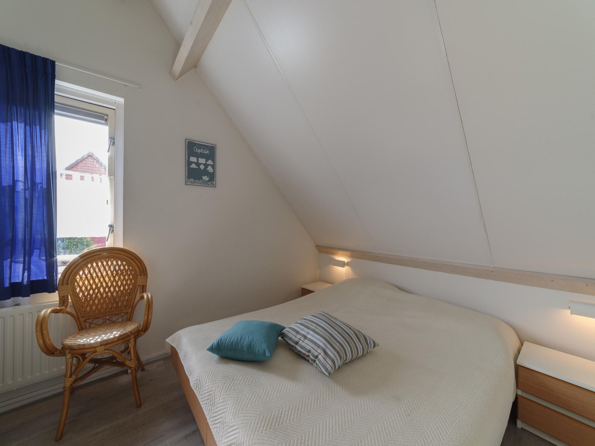 Een slaapkamer van Villapark De Oesterbaai 28 in Wemeldinge