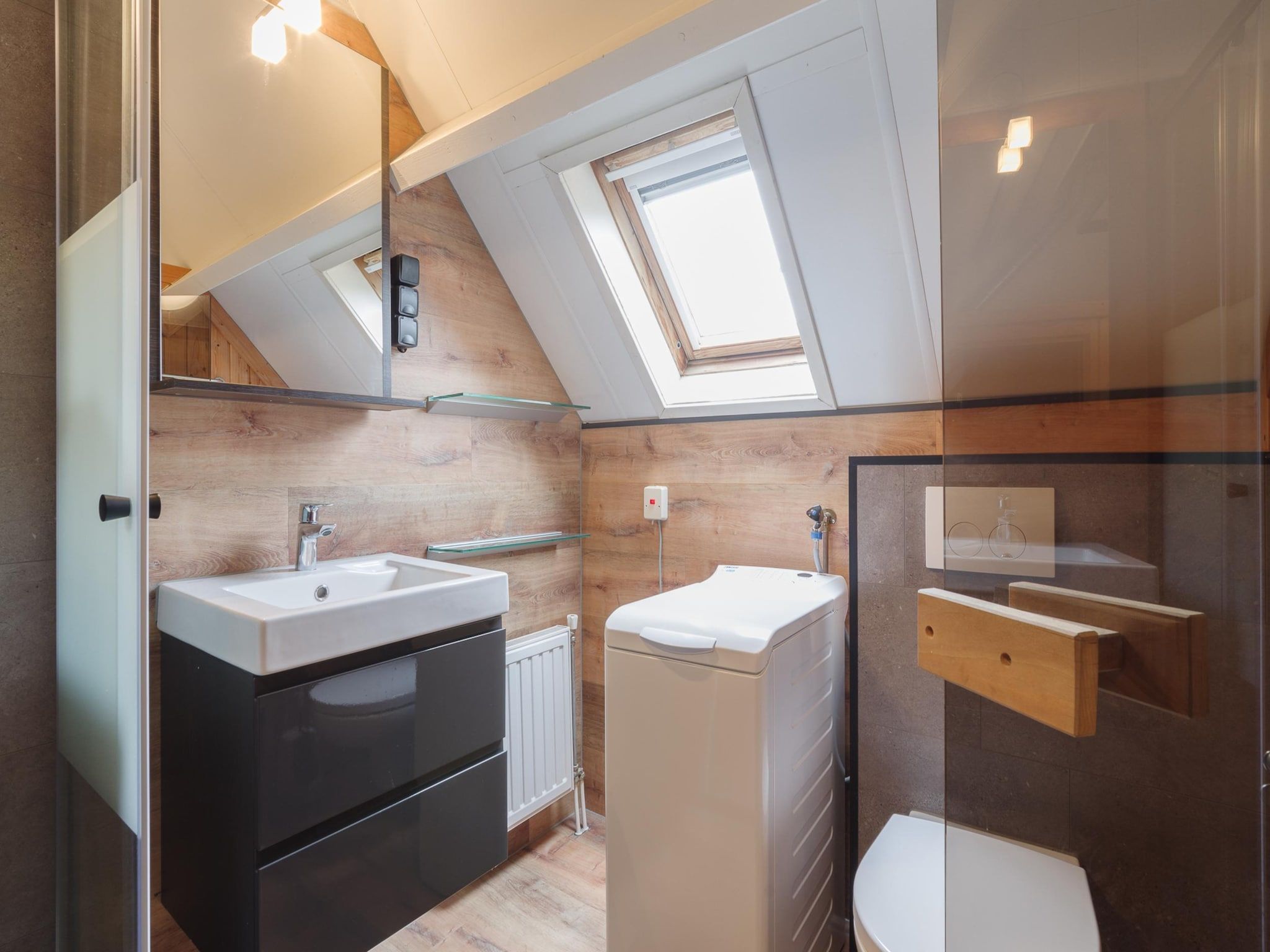 De badkamer van Villapark De Oesterbaai 49 in Wemeldinge