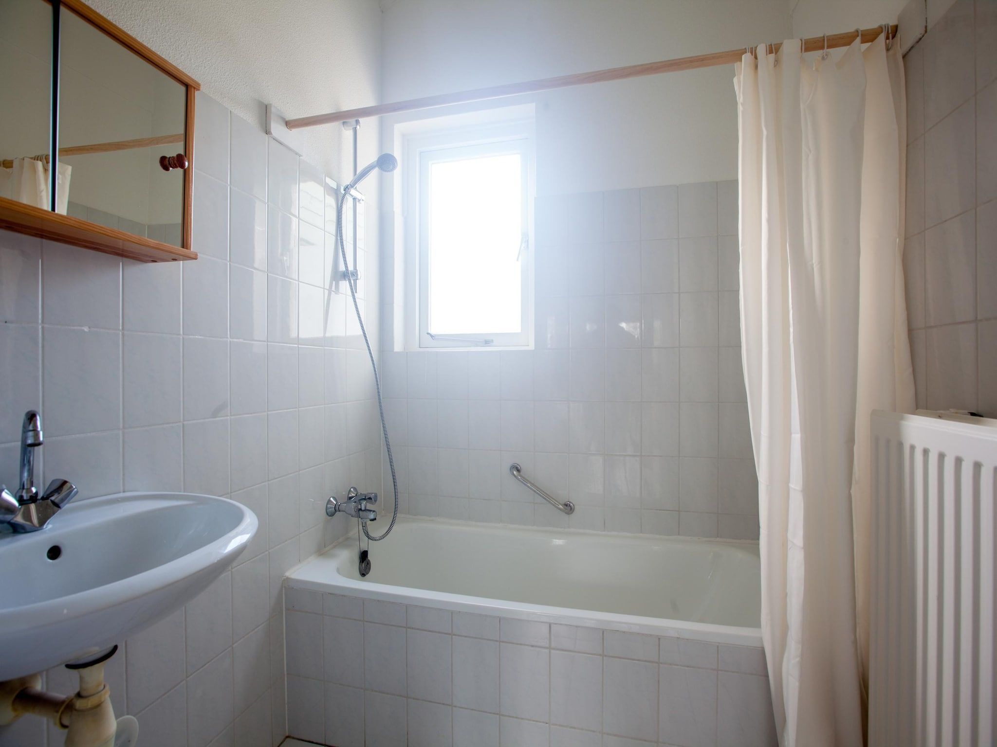 De badkamer van Villapark De Oesterbaai 64 in Wemeldinge