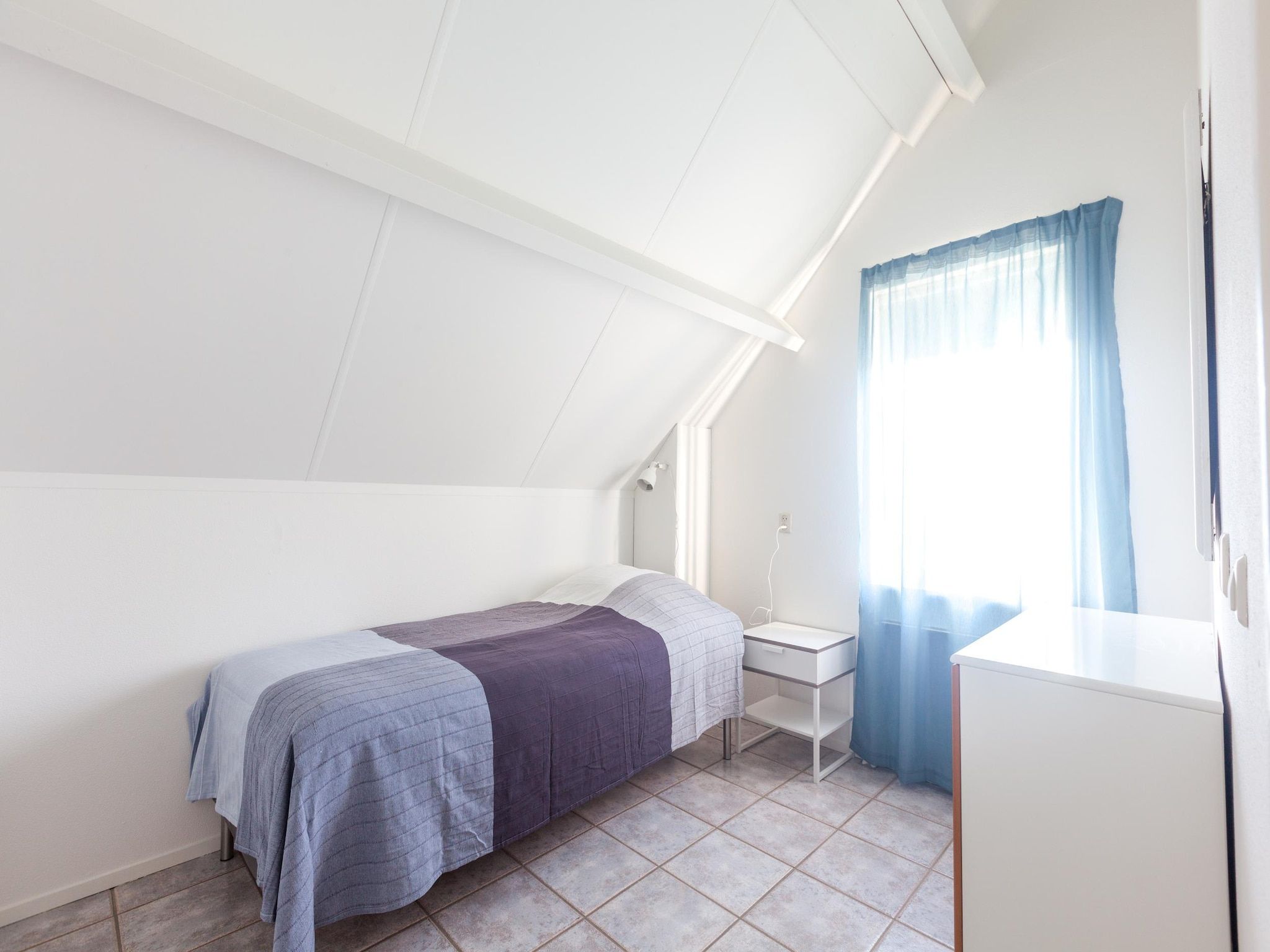 Een slaapkamer van Villapark De Oesterbaai 64 in Wemeldinge