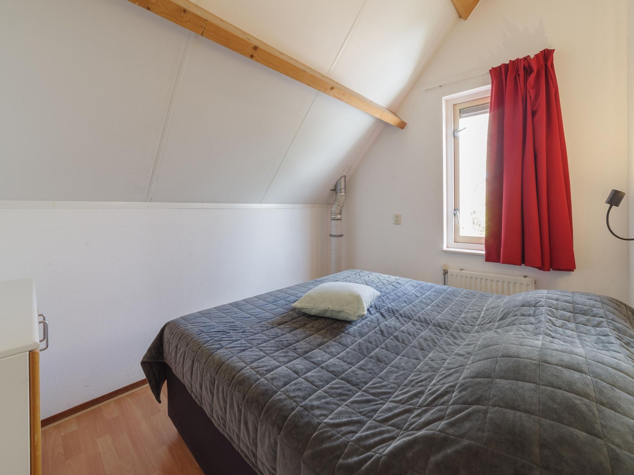 Een slaapkamer van Villapark De Oesterbaai 70 in Wemeldinge