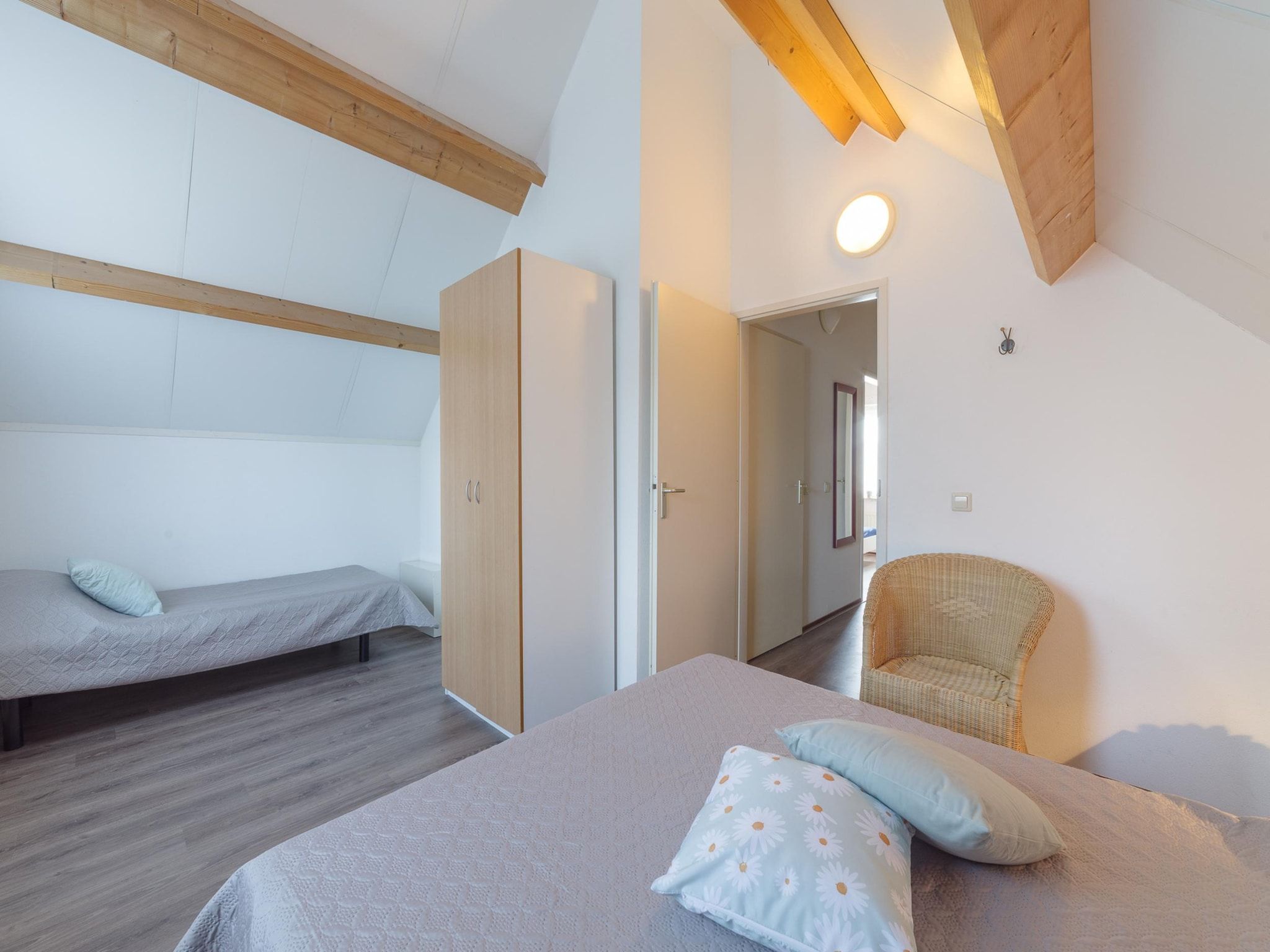 Een slaapkamer van Villapark De Oesterbaai 75 in Wemeldinge