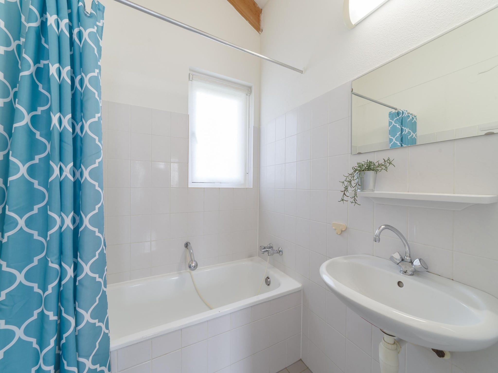 De badkamer van Villapark De Oesterbaai 77 in Wemeldinge