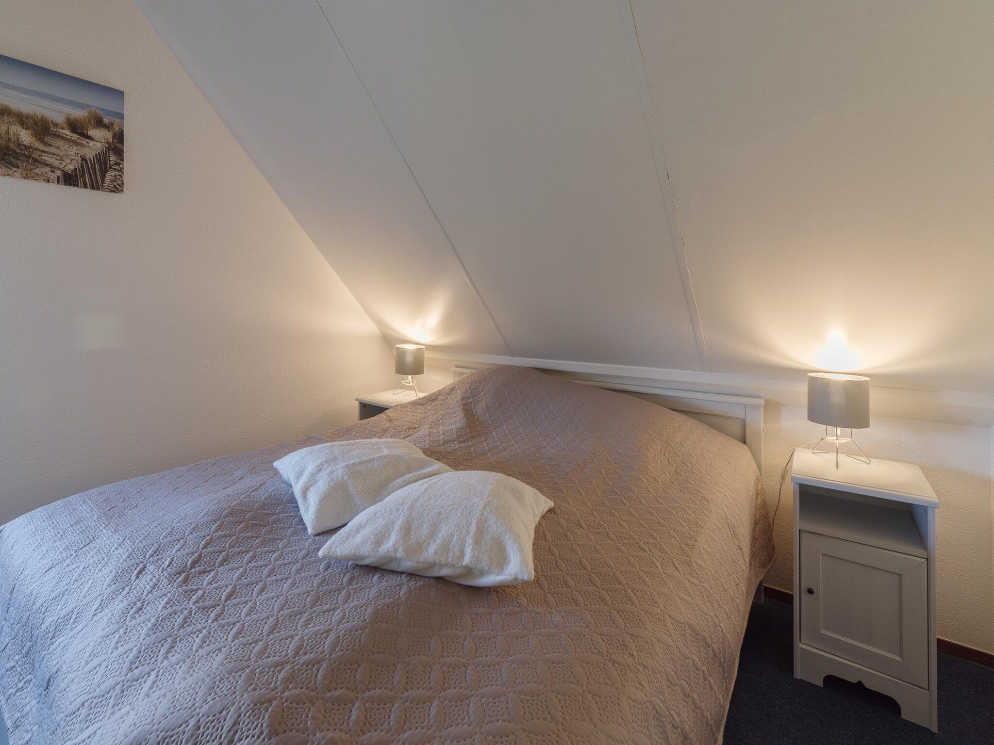 Een slaapkamer van Villapark De Oesterbaai 89 in Wemeldinge