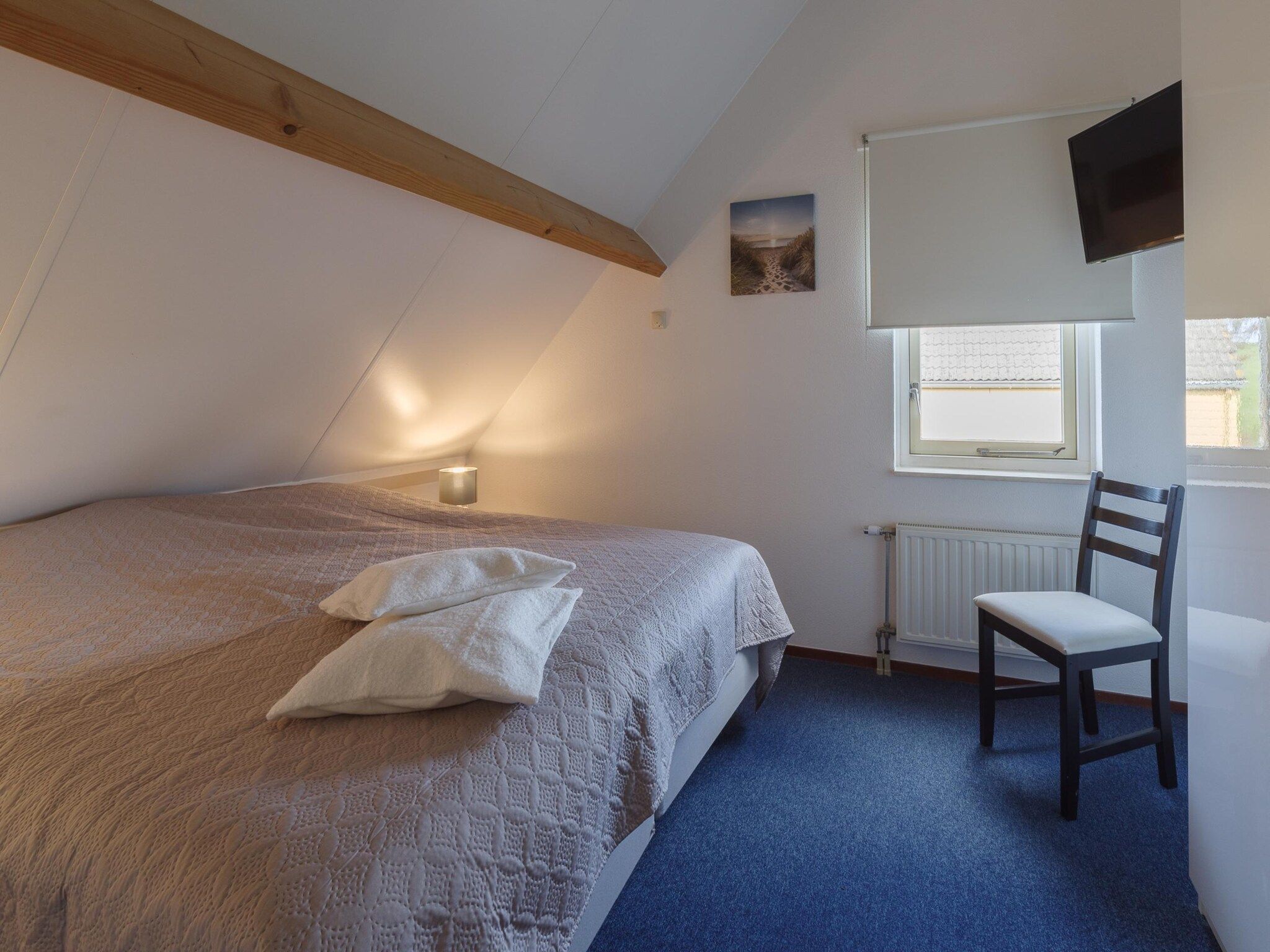 Een slaapkamer van Villapark De Oesterbaai 89 in Wemeldinge