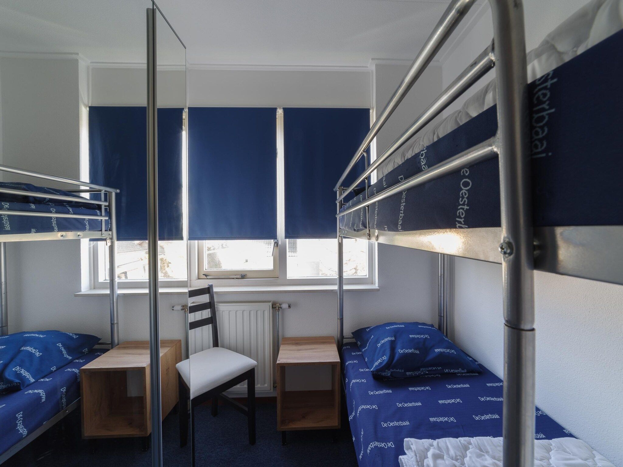 Een slaapkamer van Villapark De Oesterbaai 89 in Wemeldinge