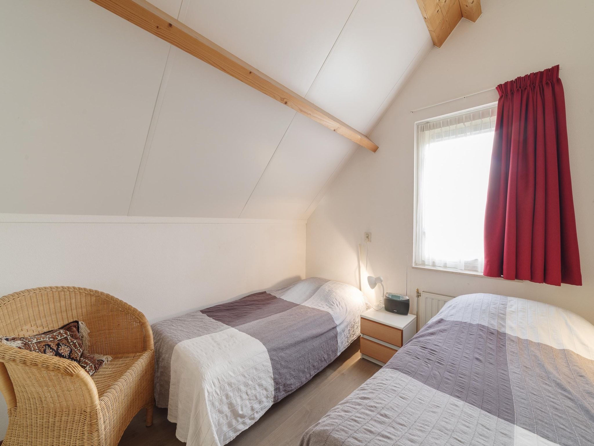 Een slaapkamer van Villapark De Oesterbaai 91 in Wemeldinge