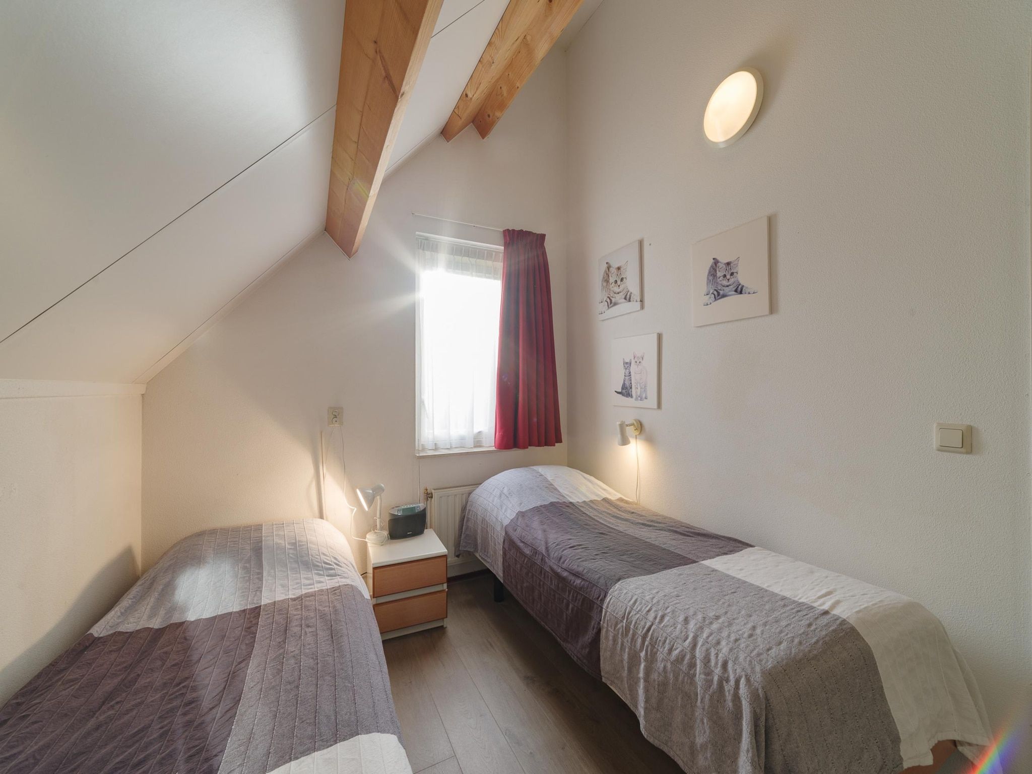 Een slaapkamer van Villapark De Oesterbaai 91 in Wemeldinge