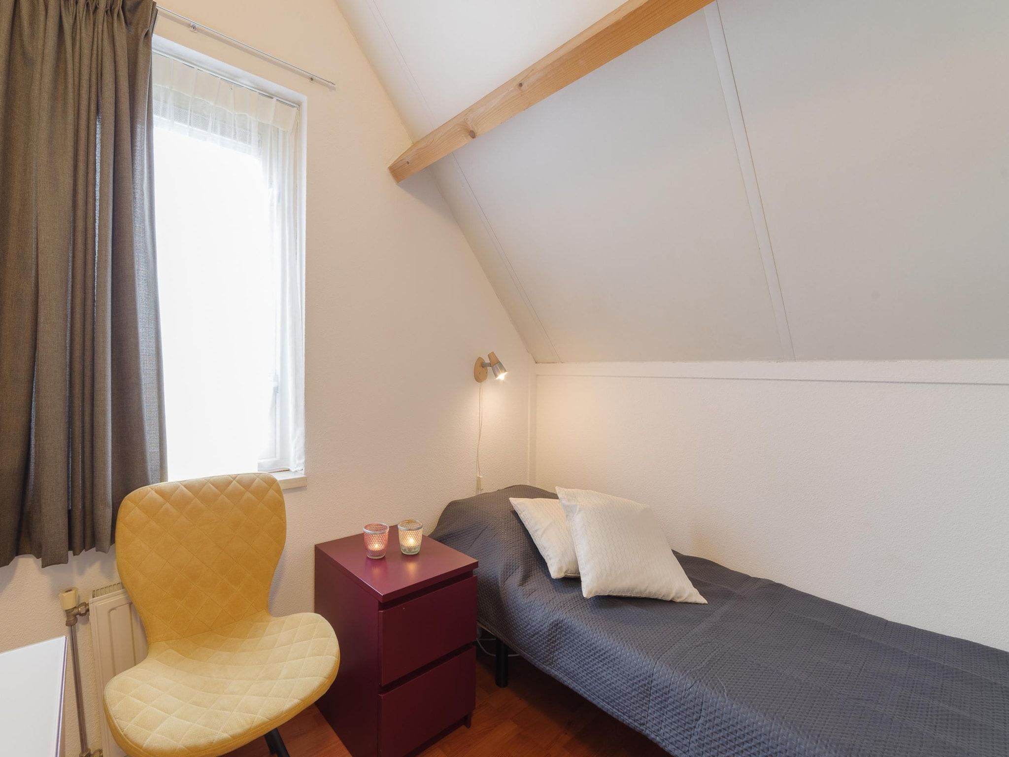 Een slaapkamer van Villapark De Oesterbaai 99 in Wemeldinge