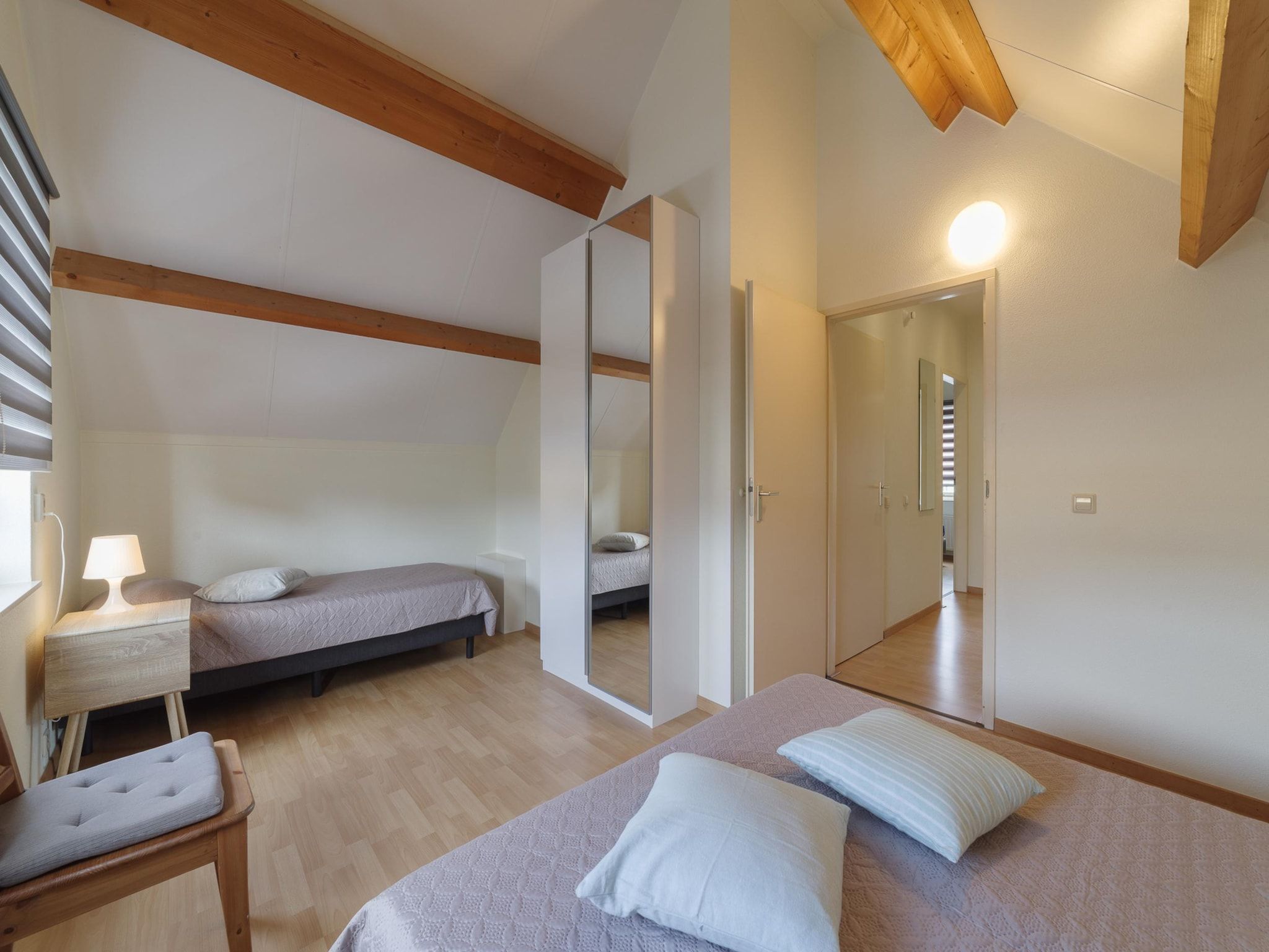 Een slaapkamer van Villapark De Oesterbaai 112 in Wemeldinge