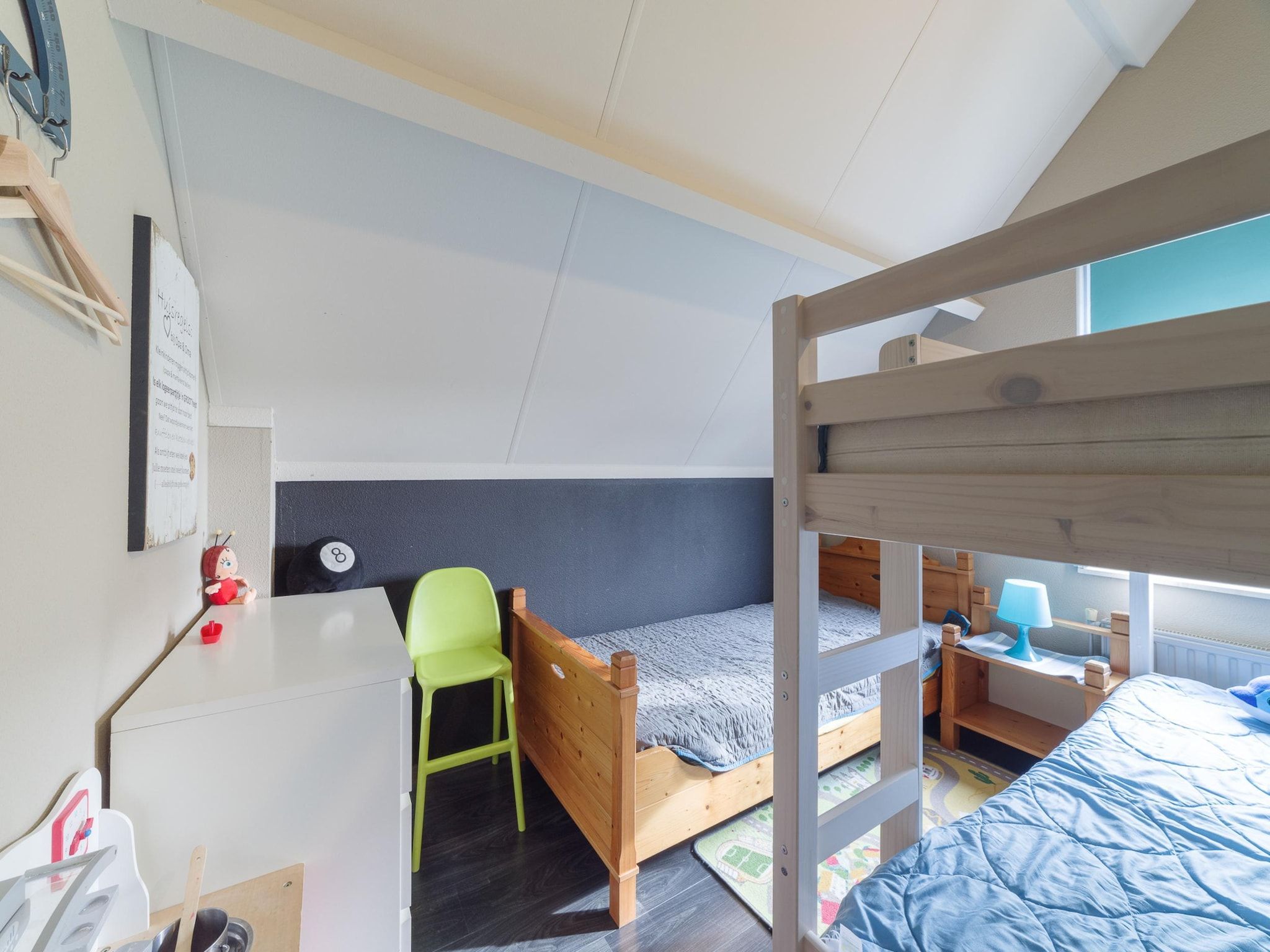 Een slaapkamer van Villapark De Oesterbaai 117 in Wemeldinge