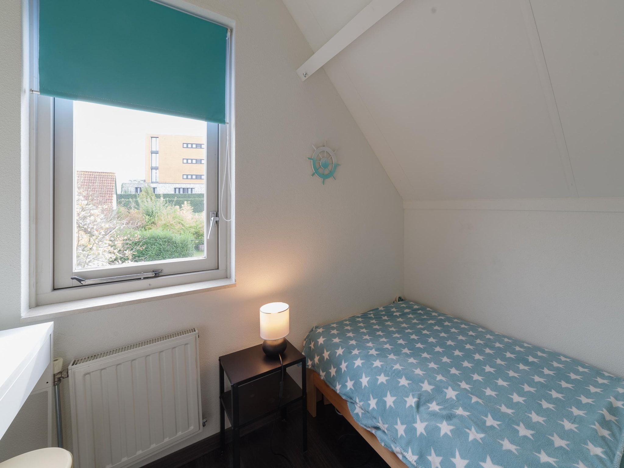 Een slaapkamer van Villapark De Oesterbaai 117 in Wemeldinge