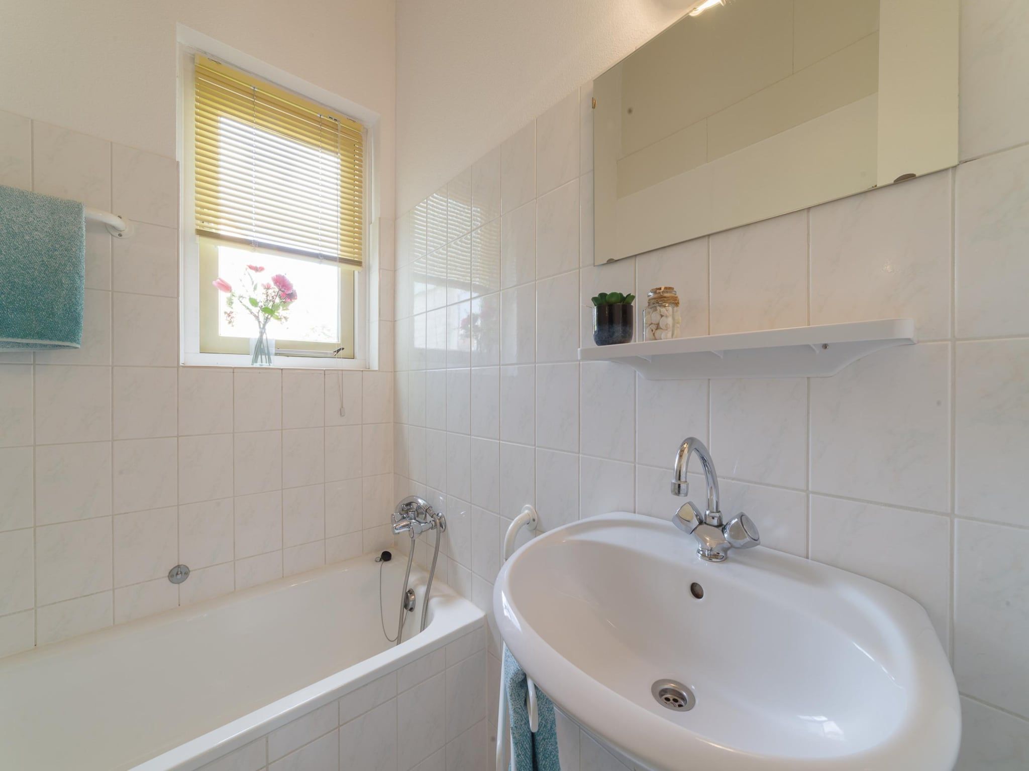 De badkamer van Villapark De Oesterbaai 123 in Wemeldinge