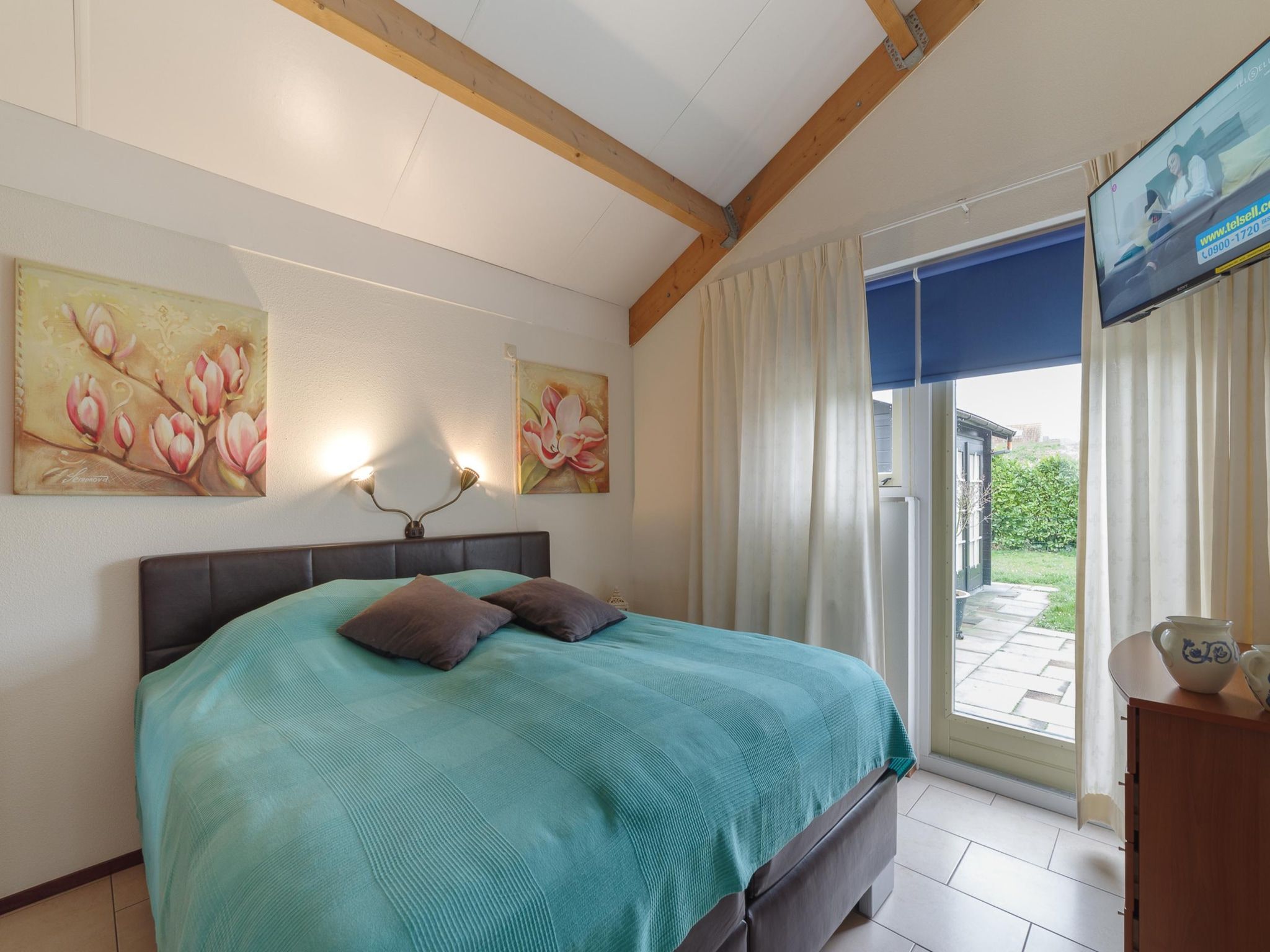 Een slaapkamer van Villapark De Oesterbaai 131 in Wemeldinge