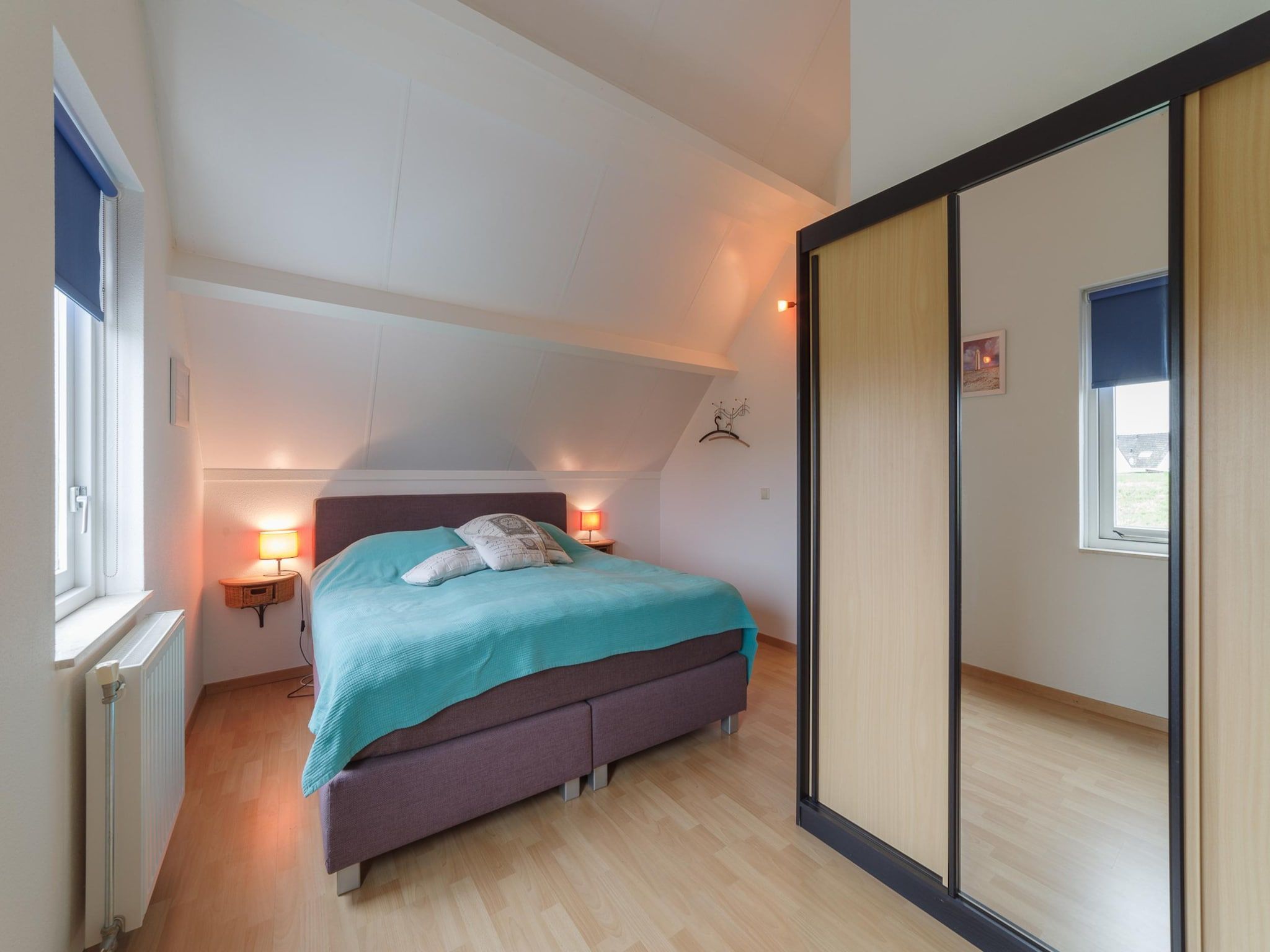 Een slaapkamer van Villapark De Oesterbaai 131 in Wemeldinge