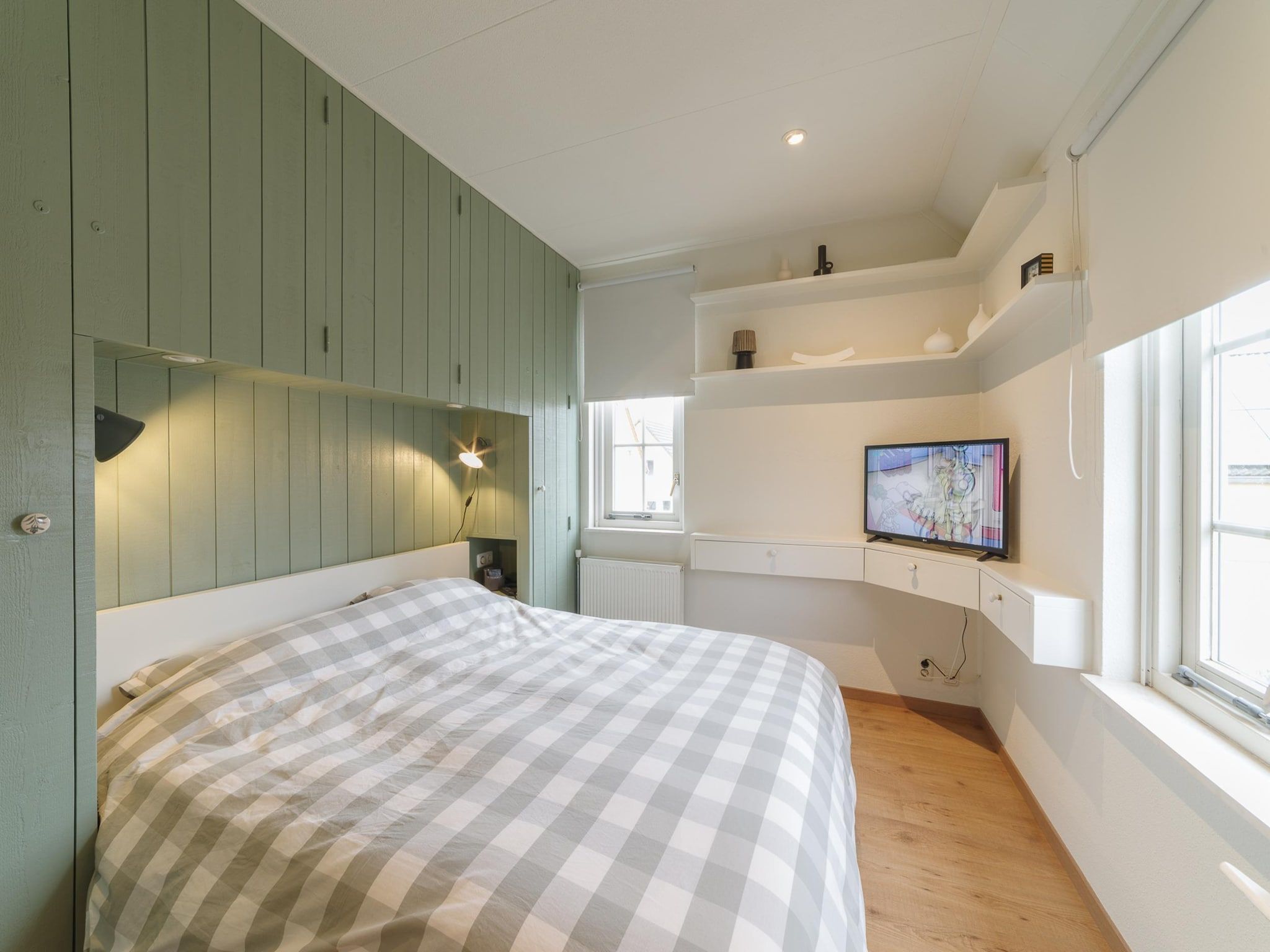 Een slaapkamer van Villapark De Oesterbaai 136 in Wemeldinge