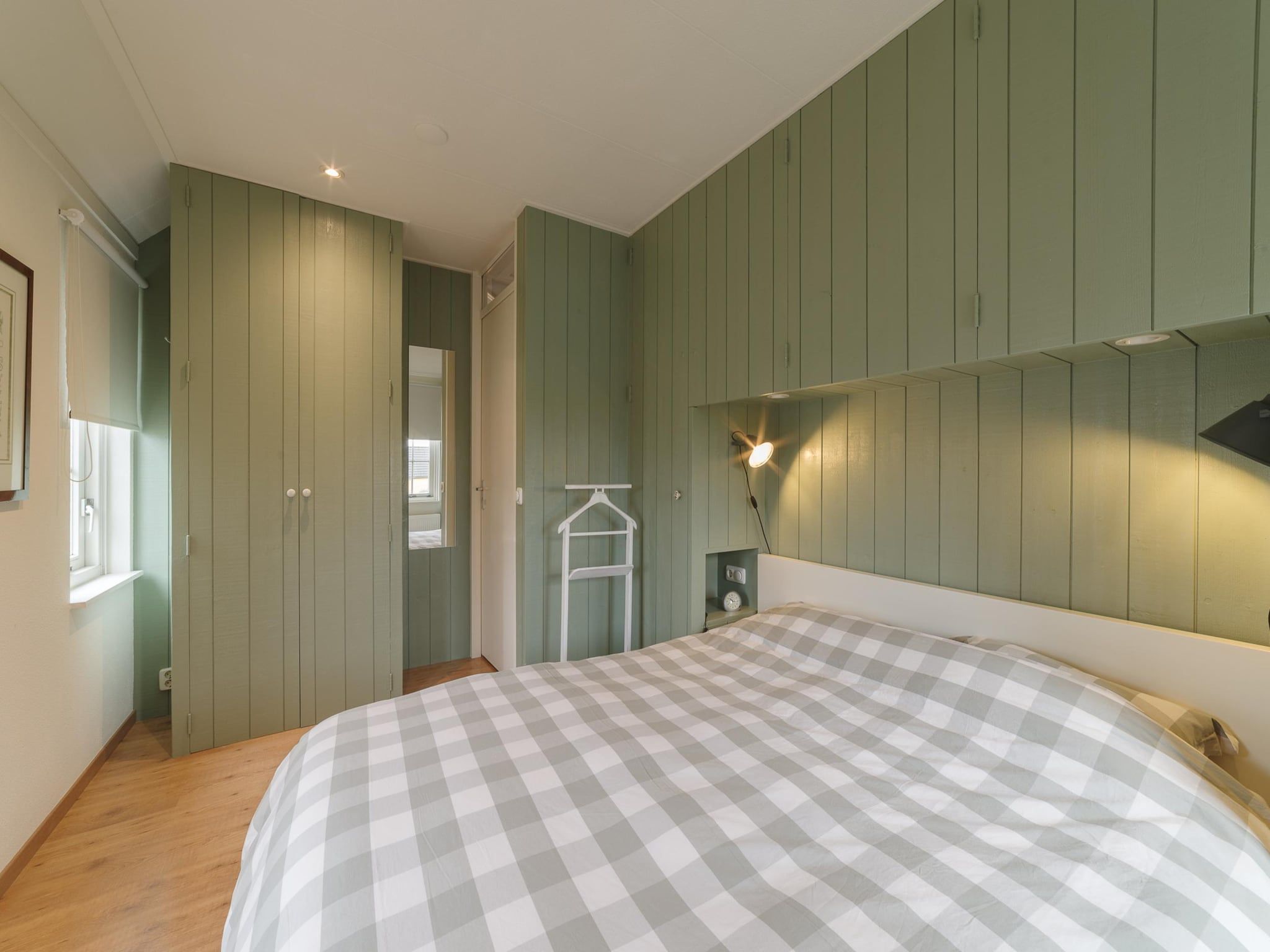 Een slaapkamer van Villapark De Oesterbaai 136 in Wemeldinge