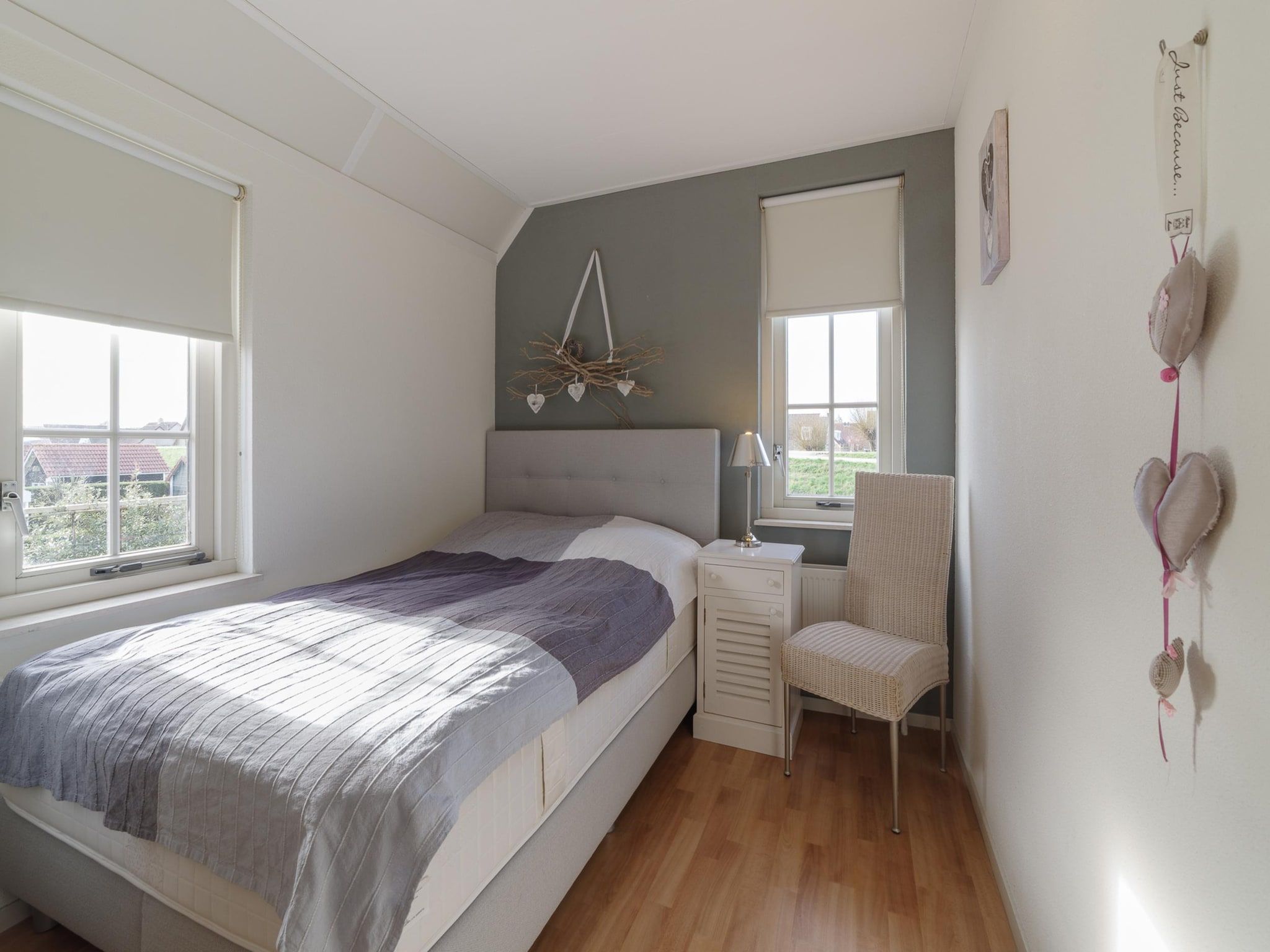 Een slaapkamer van Villapark De Oesterbaai 142 in Wemeldinge