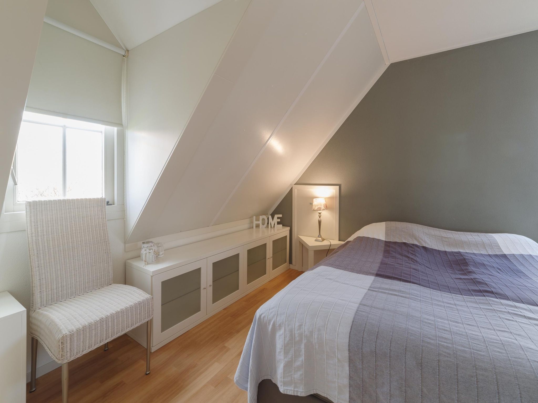 Een slaapkamer van Villapark De Oesterbaai 142 in Wemeldinge