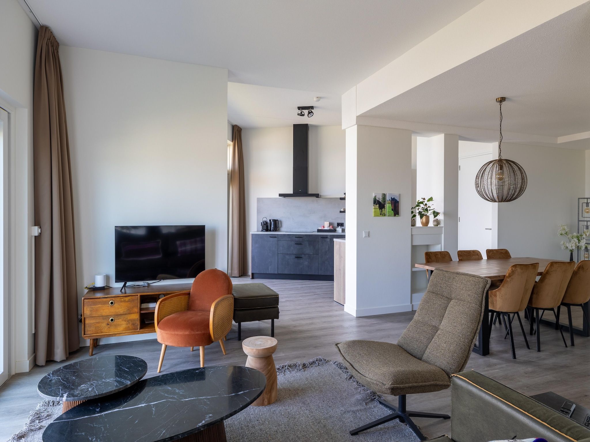 De woonkamer van Luxe appartement Vista Maris 'Laguna Beach House' - Havenweg 8-32  Sint-Annaland Oosterschelde in Sint-Annaland