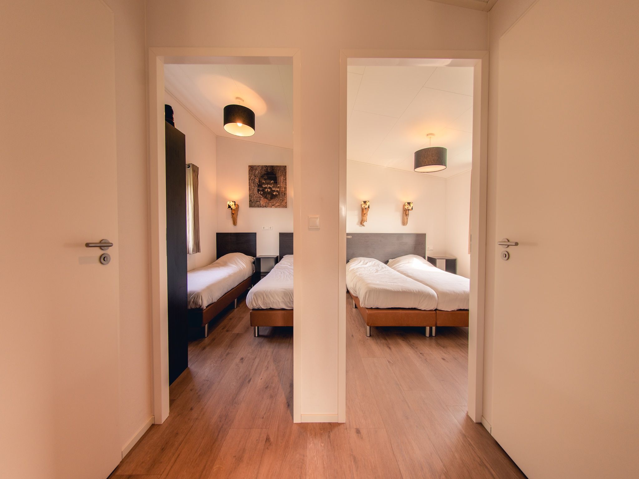 Een slaapkamer van Raccoon Lodge in Slagharen