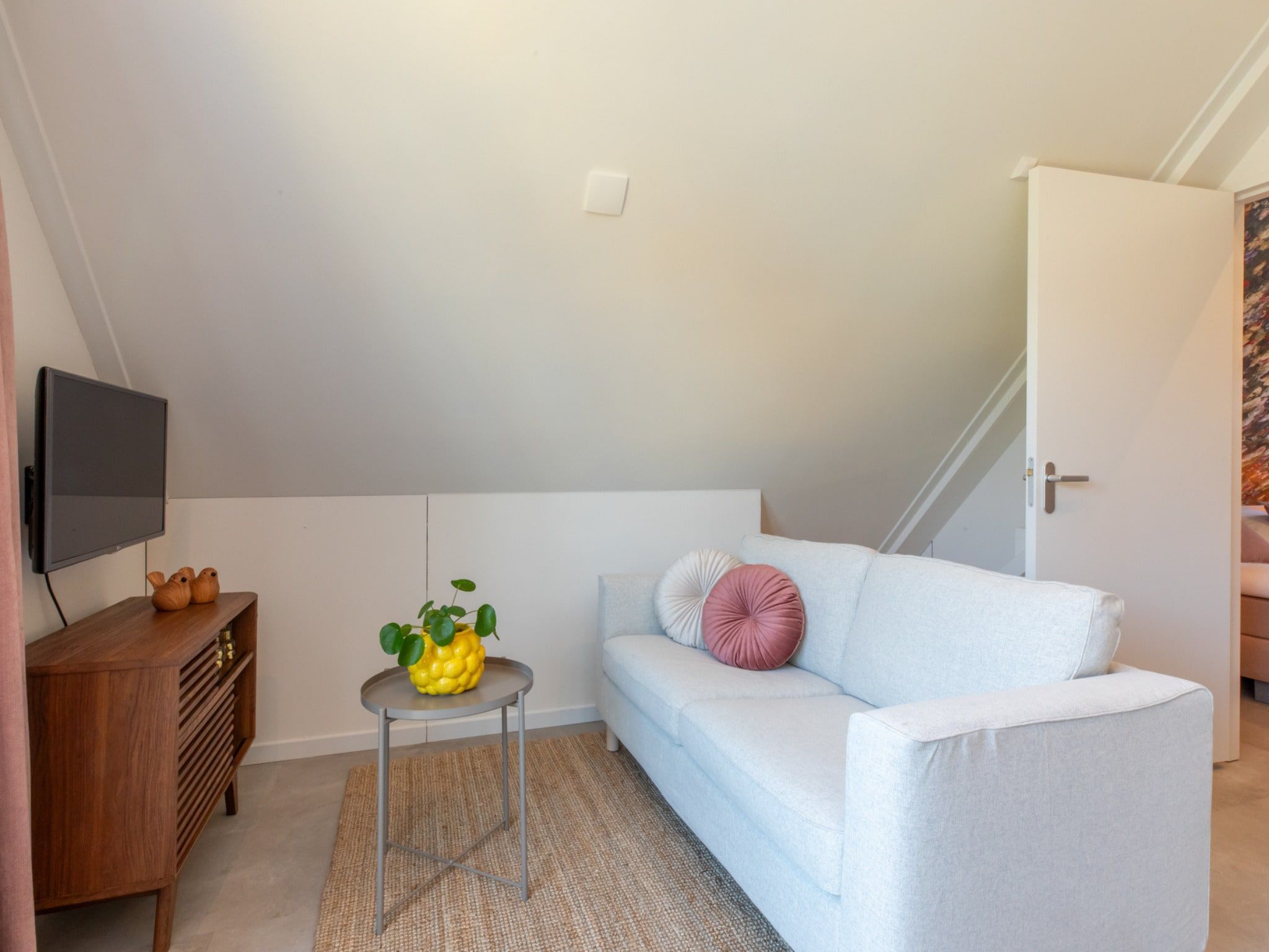 De woonkamer van Appartement 'Bed by Al' - Hoofdstraat 16 a  Kortgene in kortgene