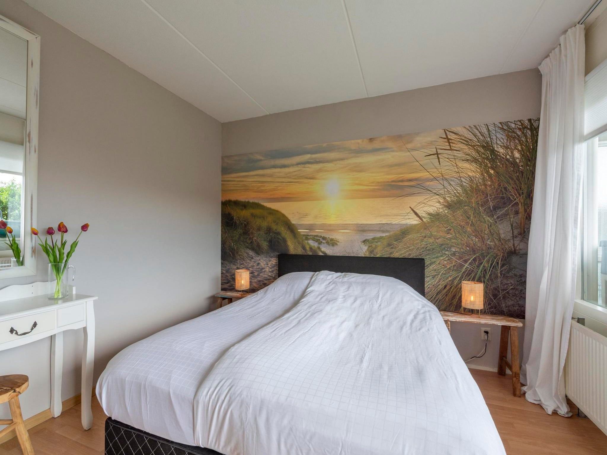 Een slaapkamer van Beach Appartement 28 in Callantsoog