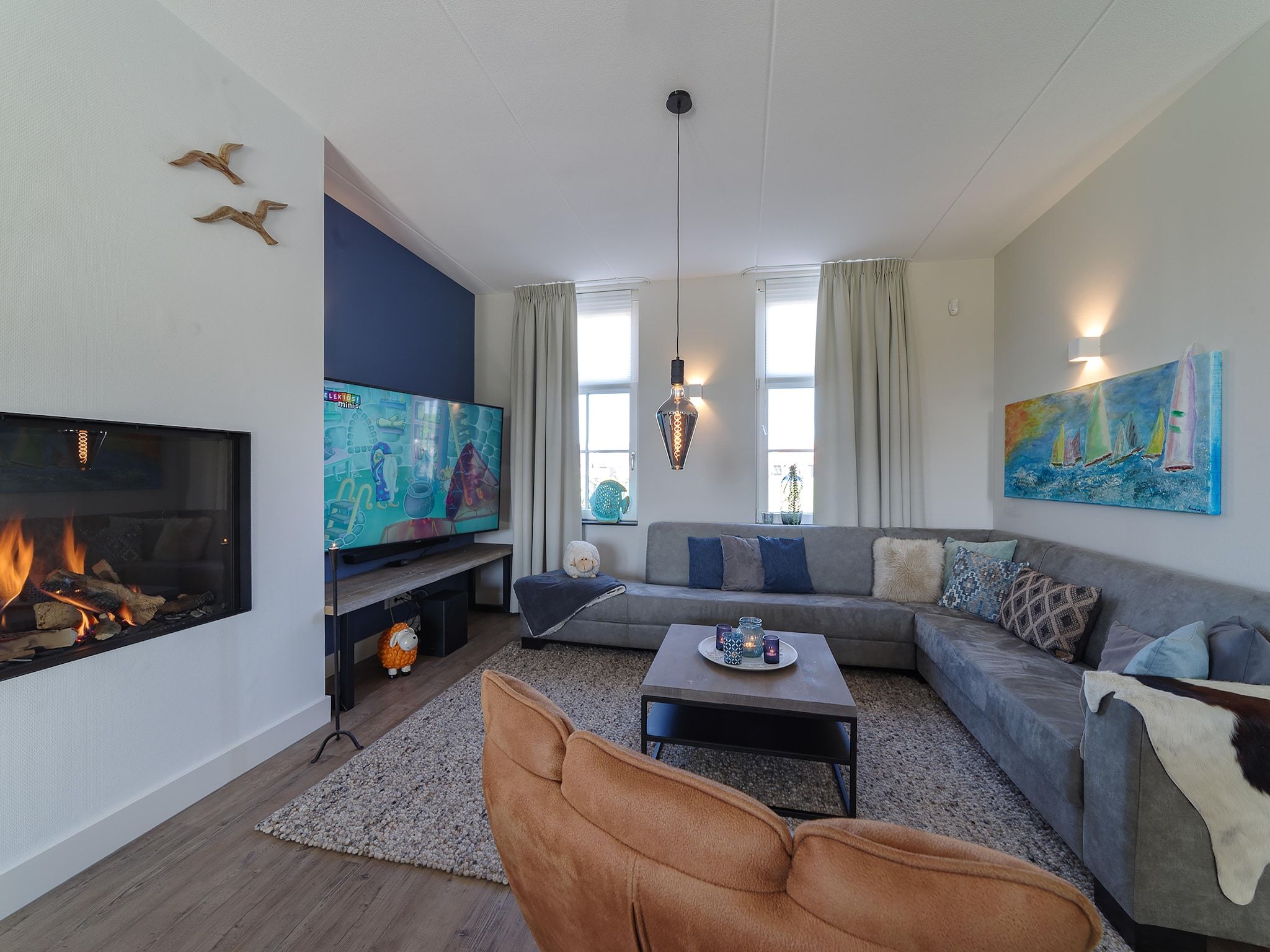 De woonkamer van Game Villa in Colijnsplaat