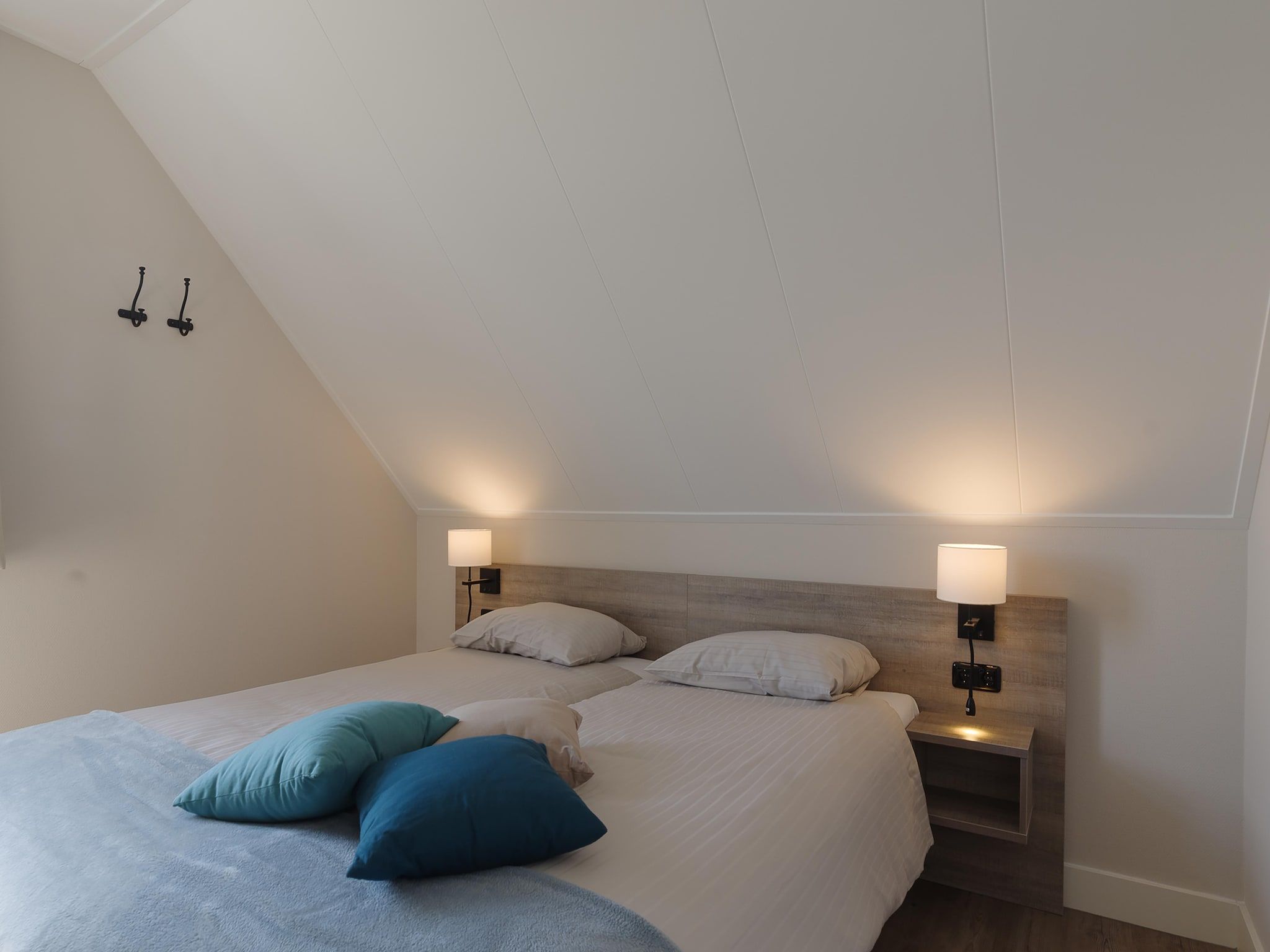 Een slaapkamer van Game Villa in Colijnsplaat