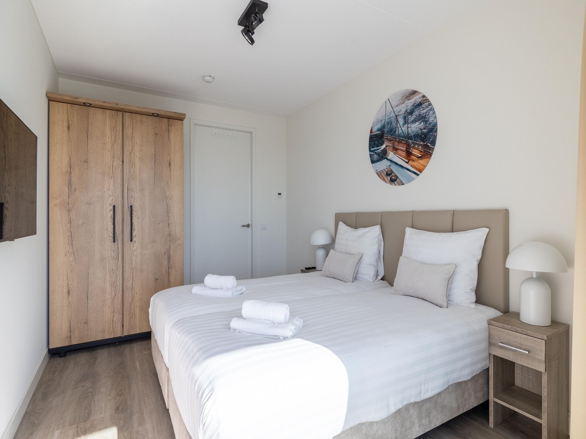 Een slaapkamer van Appartement Vista Maris "Charlotte's Parel" - Havenweg 8-44  Sint-Annaland in Sint-Annaland