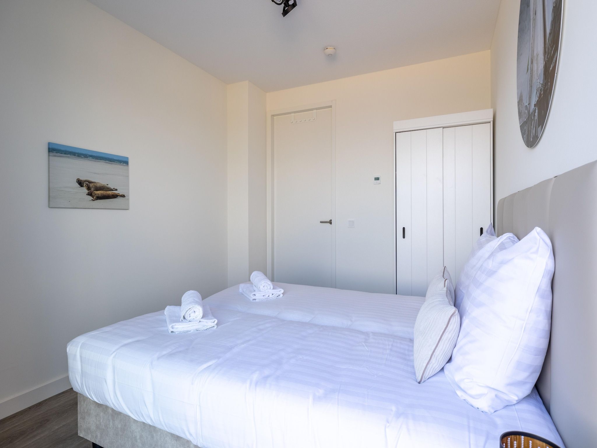 Een slaapkamer van Appartement Vista Maris "Charlotte's Parel" - Havenweg 8-44  Sint-Annaland in Sint-Annaland