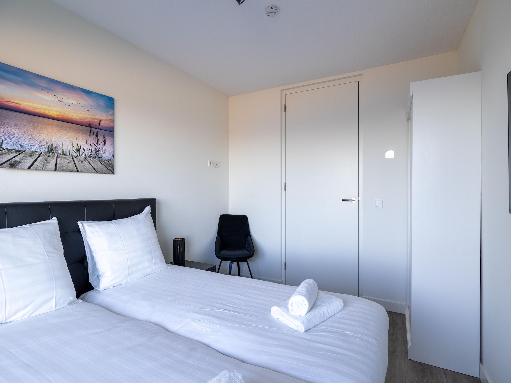 Een slaapkamer van Luxe appartement Vista Maris - Havenweg 8-34  Sint-Annaland Oosterschelde in Sint-Annaland