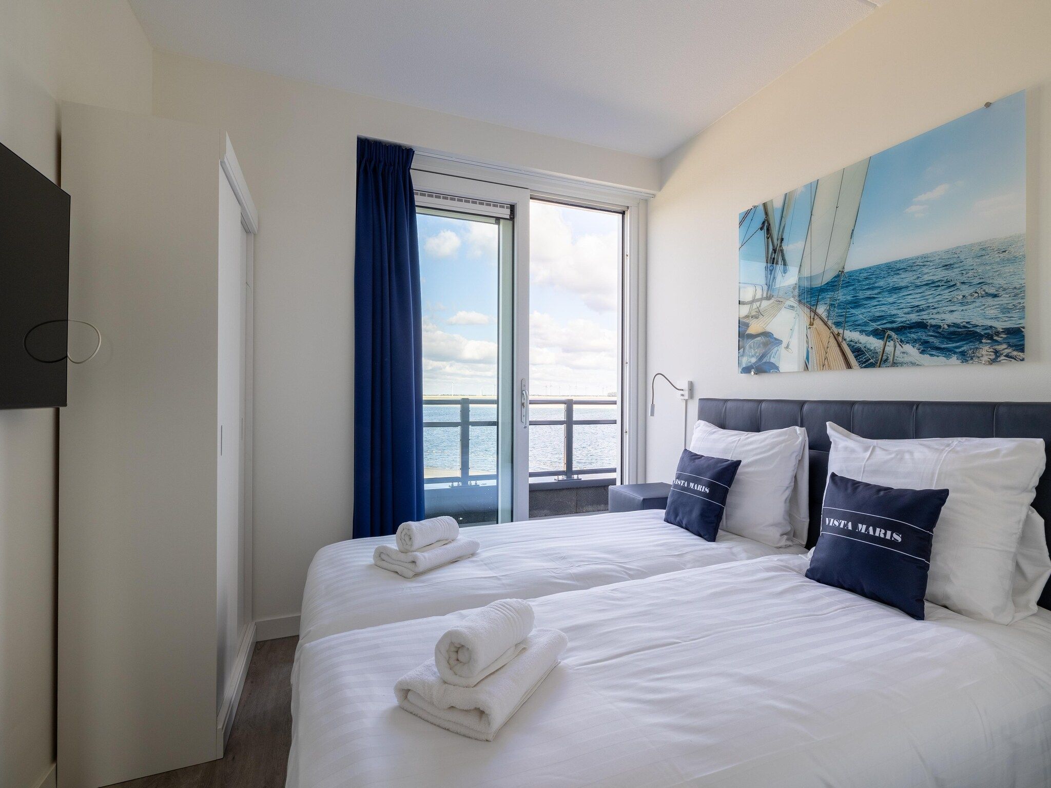 Een slaapkamer van Appartement Vista Maris - Havenweg 8-52  Sint-Annaland Oosterschelde in Sint-Annaland