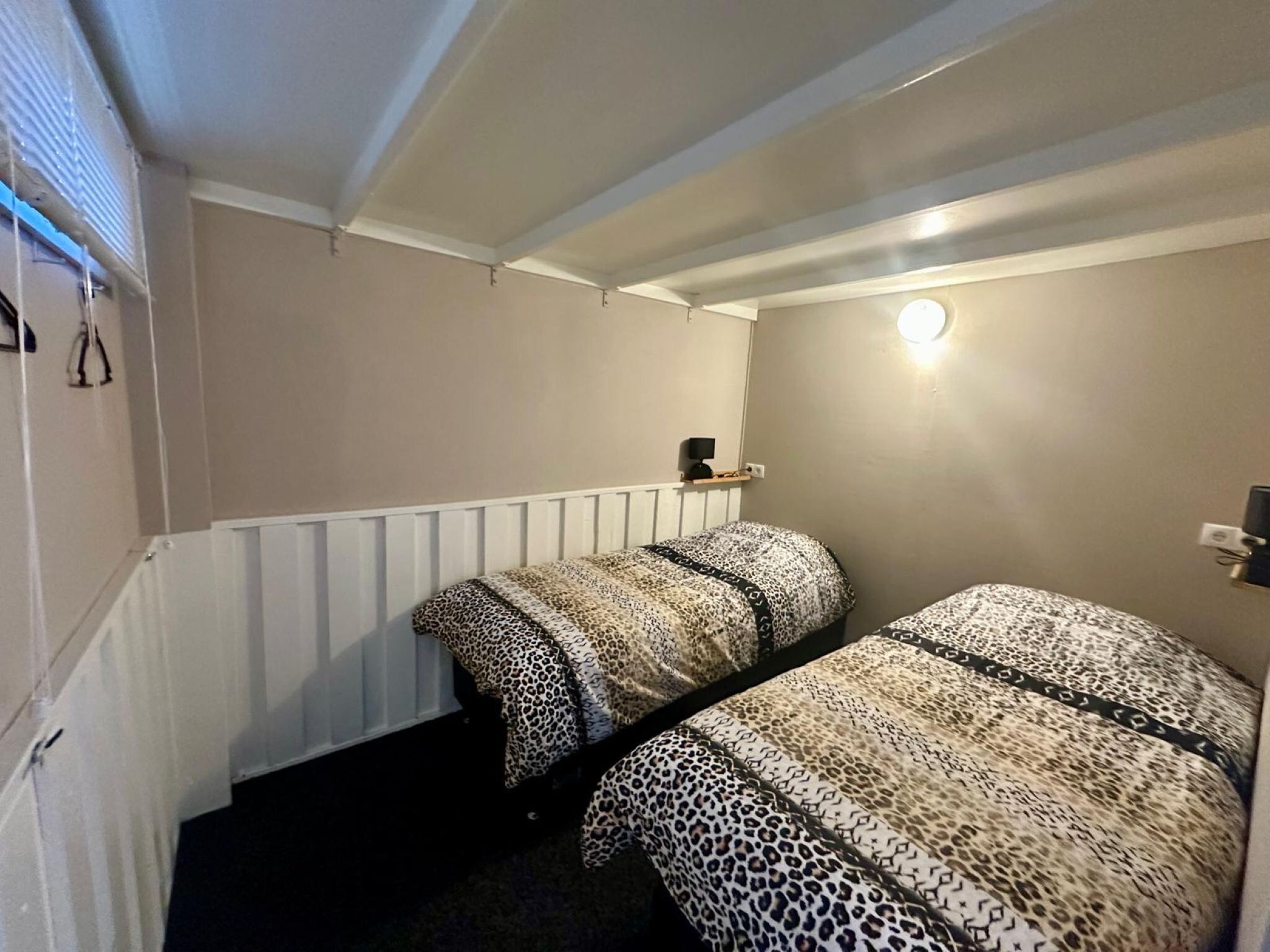 Een slaapkamer van Okken House 3A in Elim