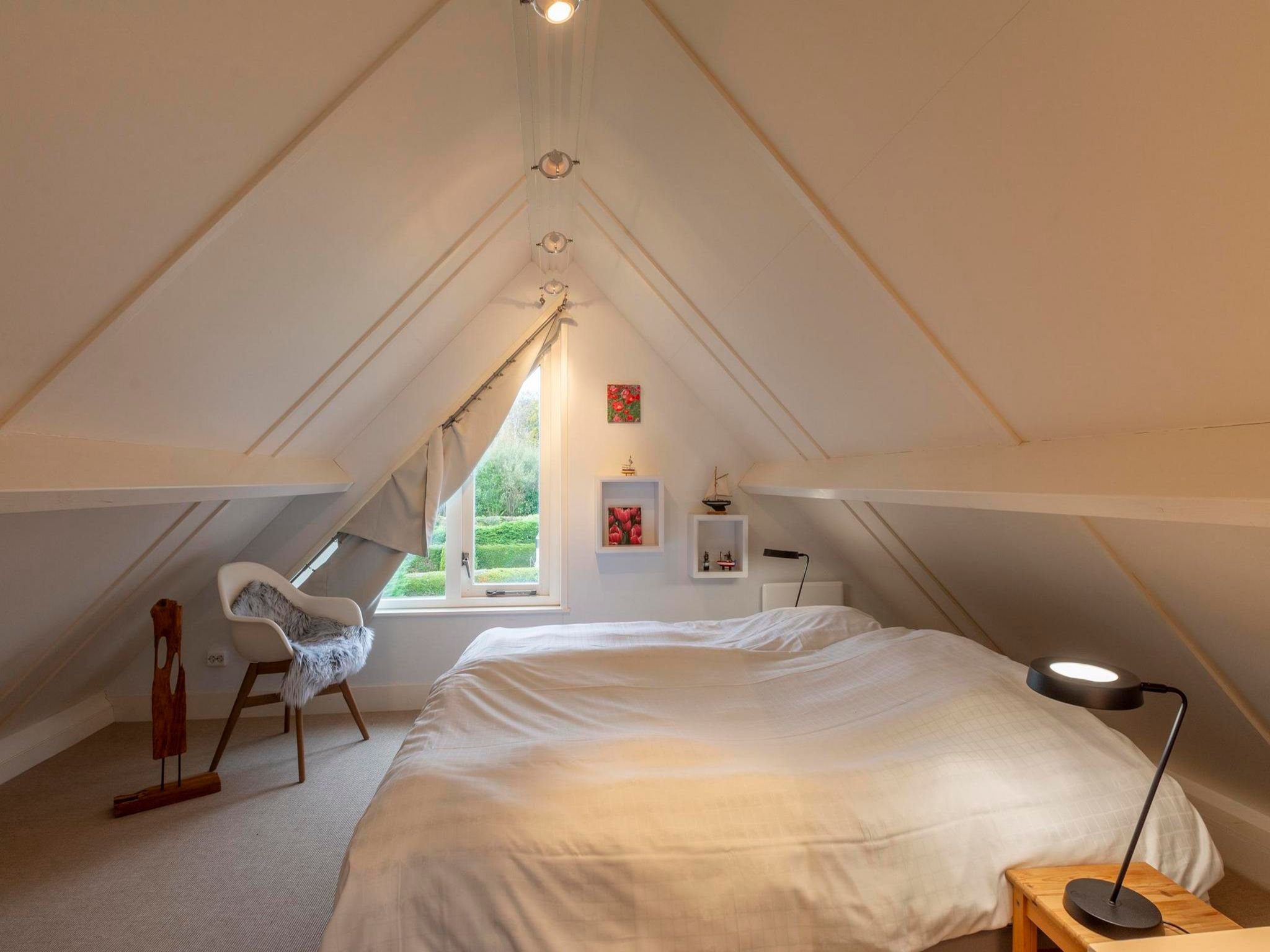 Een slaapkamer van Belkmerduinen 2 in Sint Maartenszee