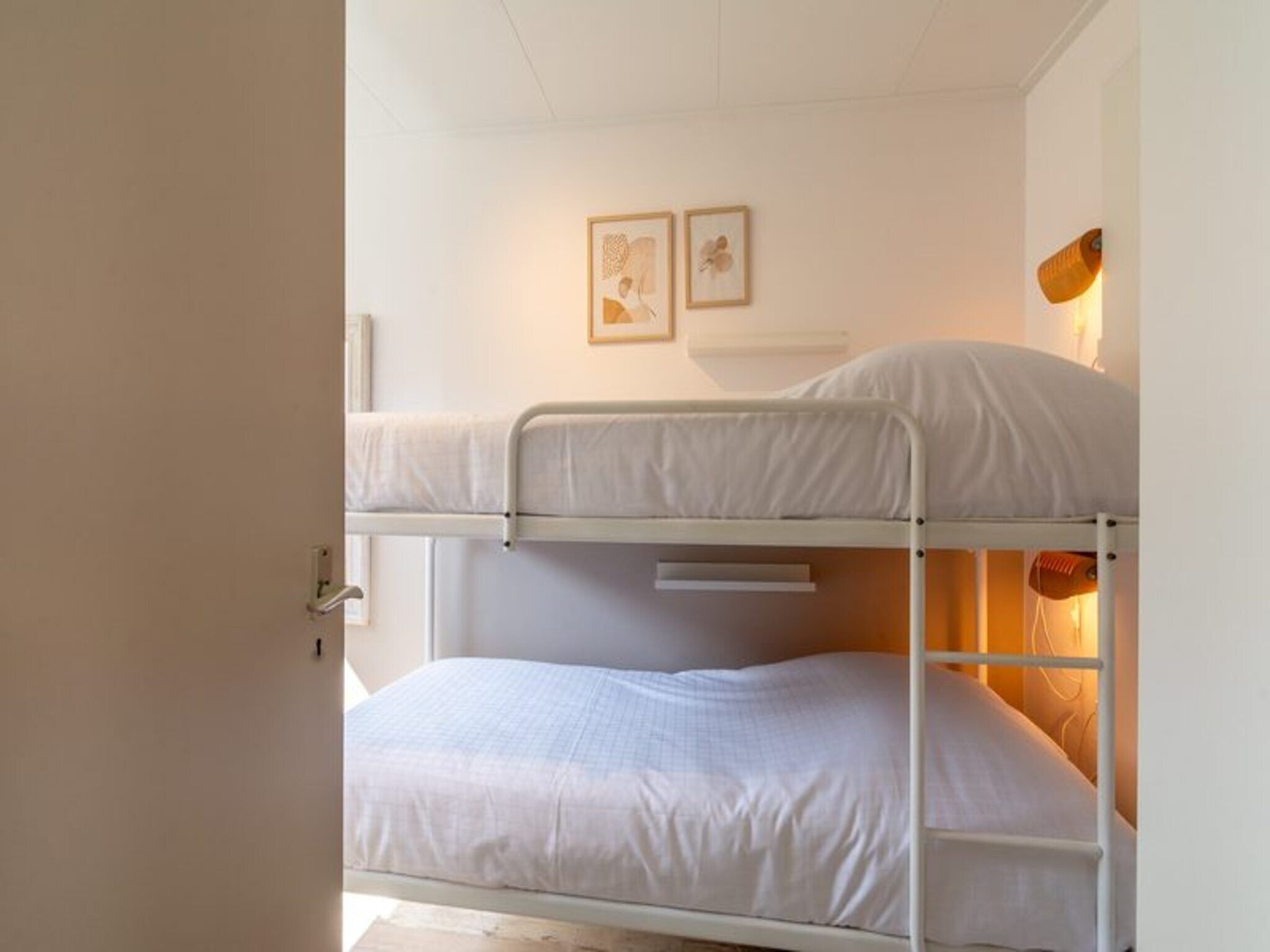 Een slaapkamer van Duinland 188 in Sint Maartenszee