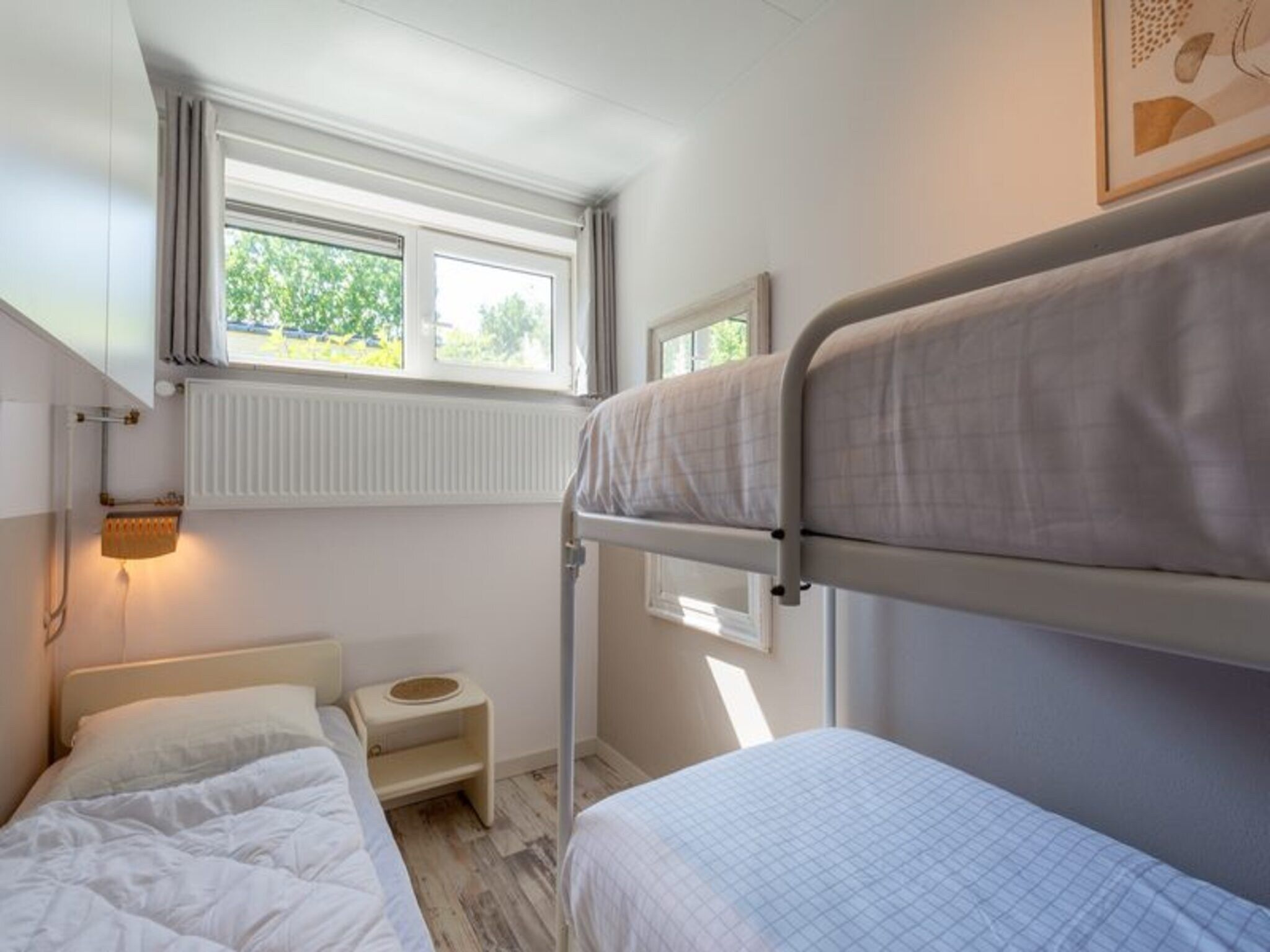 Een slaapkamer van Duinland 188 in Sint Maartenszee