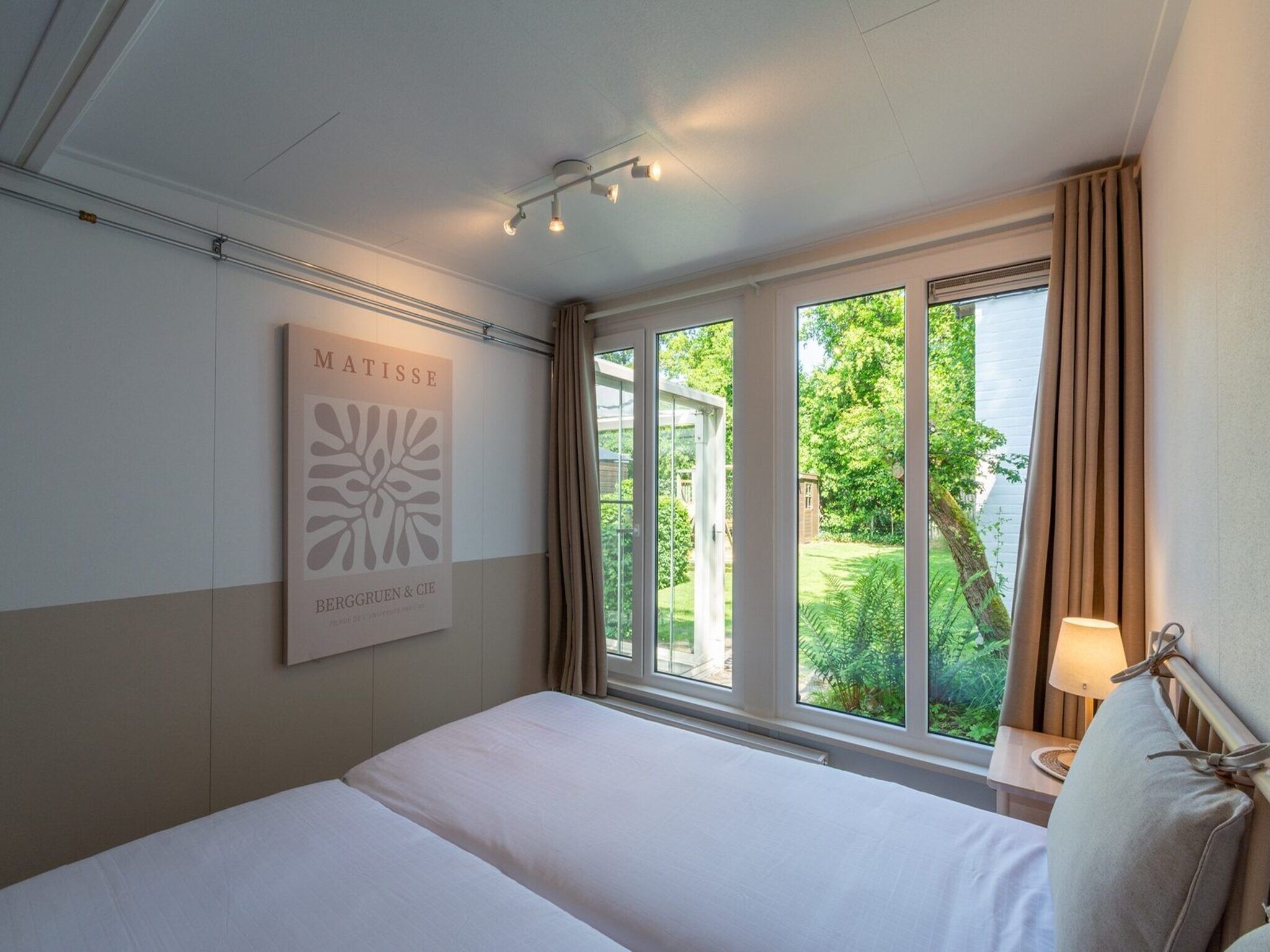 Een slaapkamer van Duinland 188 in Sint Maartenszee