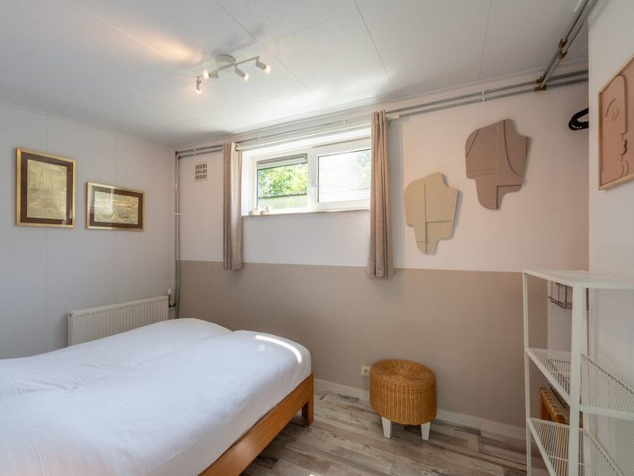 Een slaapkamer van Duinland 188 in Sint Maartenszee