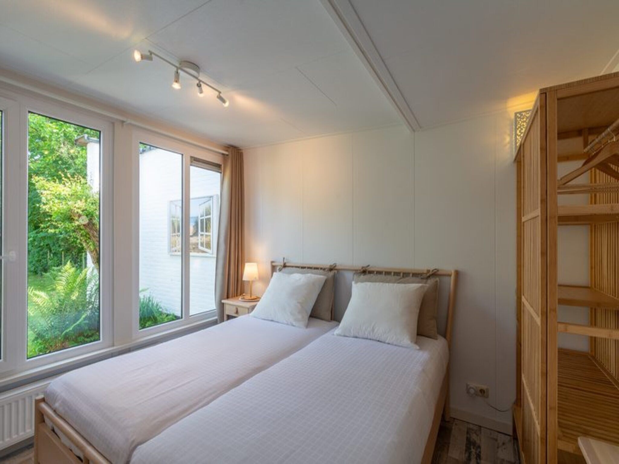 Een slaapkamer van Duinland 188 in Sint Maartenszee