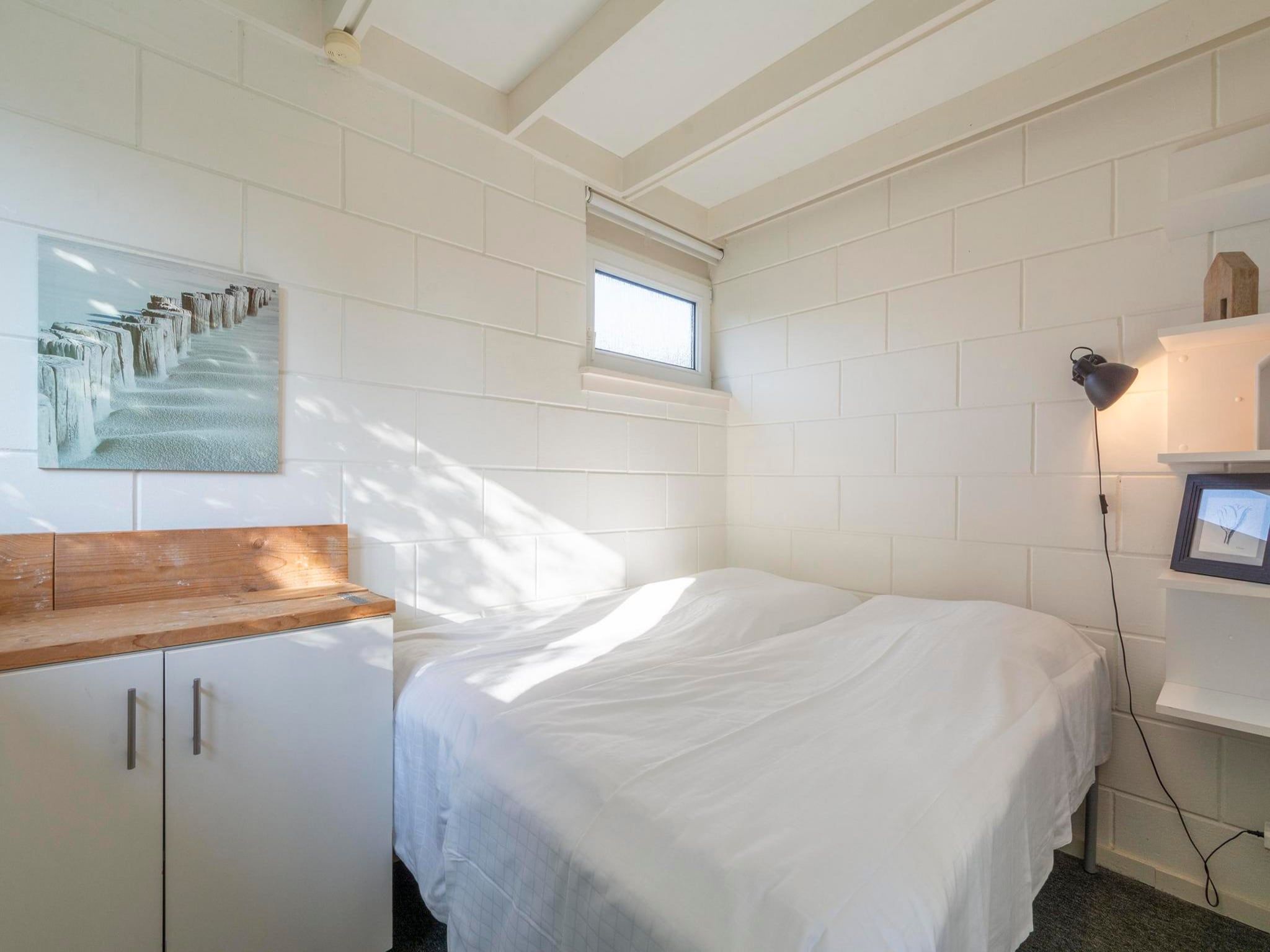 Een slaapkamer van Duinland 21 in Sint Maartenszee