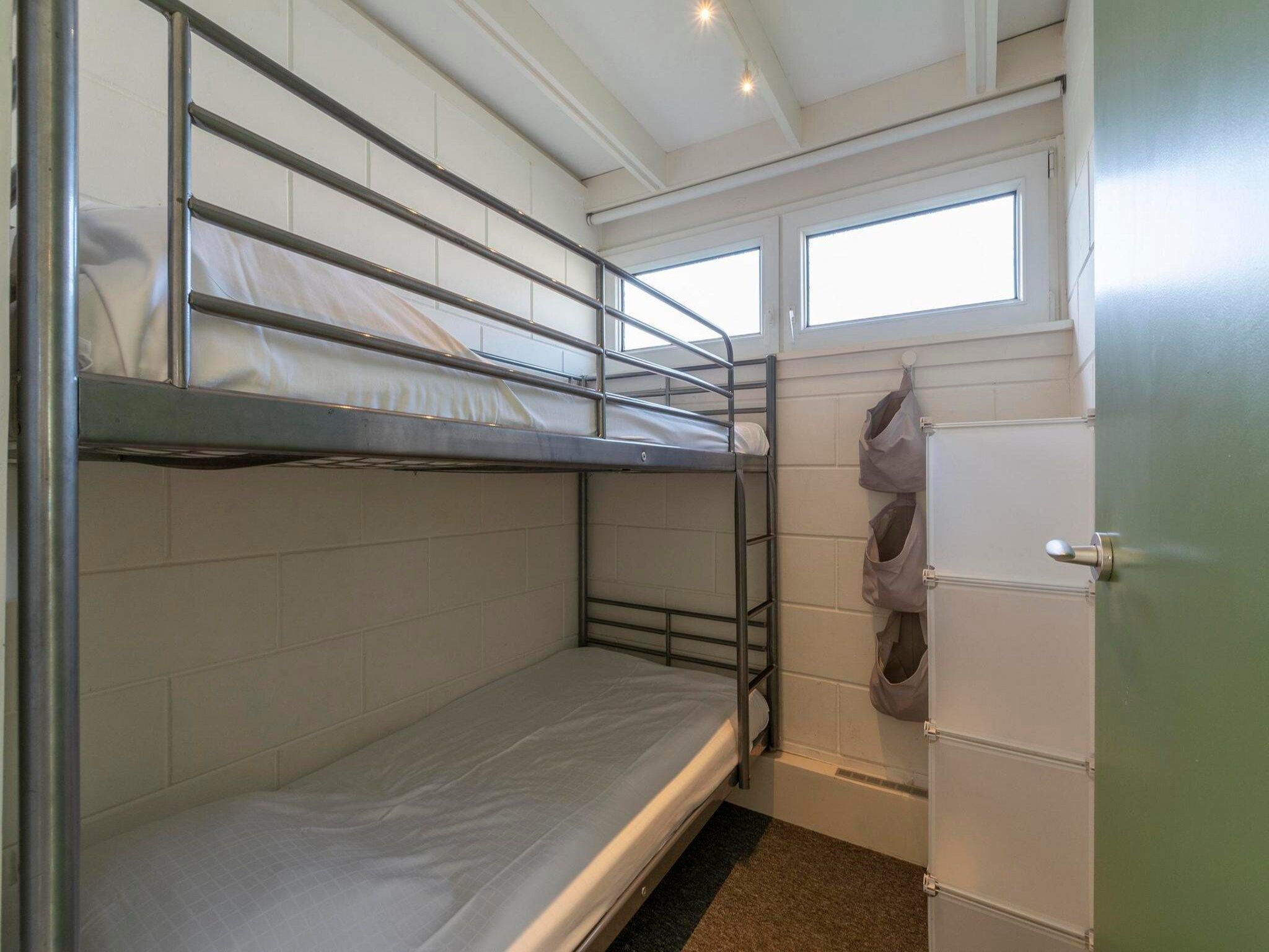 Een slaapkamer van Duinland 21 in Sint Maartenszee